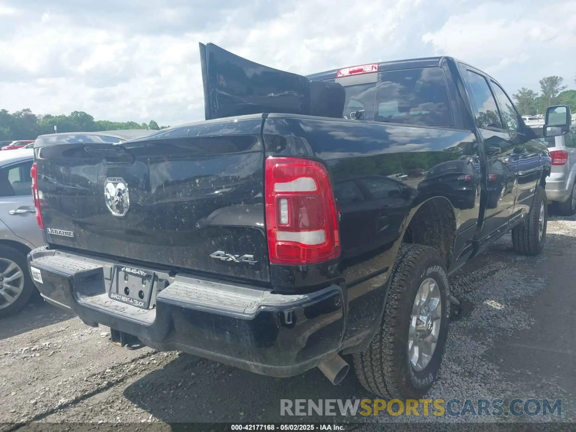4 Photograph of a damaged car 3C6UR5FL3RG407946 RAM 2500 2024