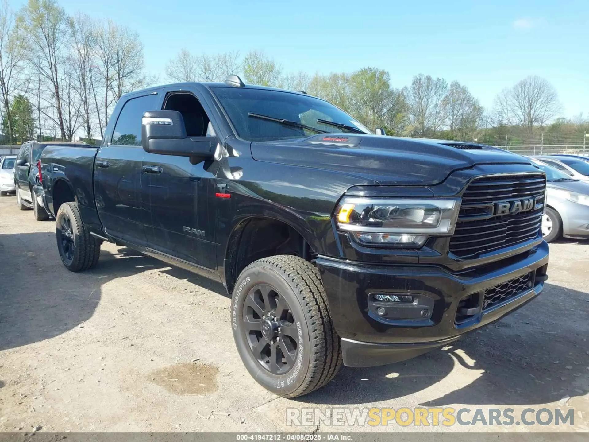 1 Photograph of a damaged car 3C6UR5FL4RG112791 RAM 2500 2024