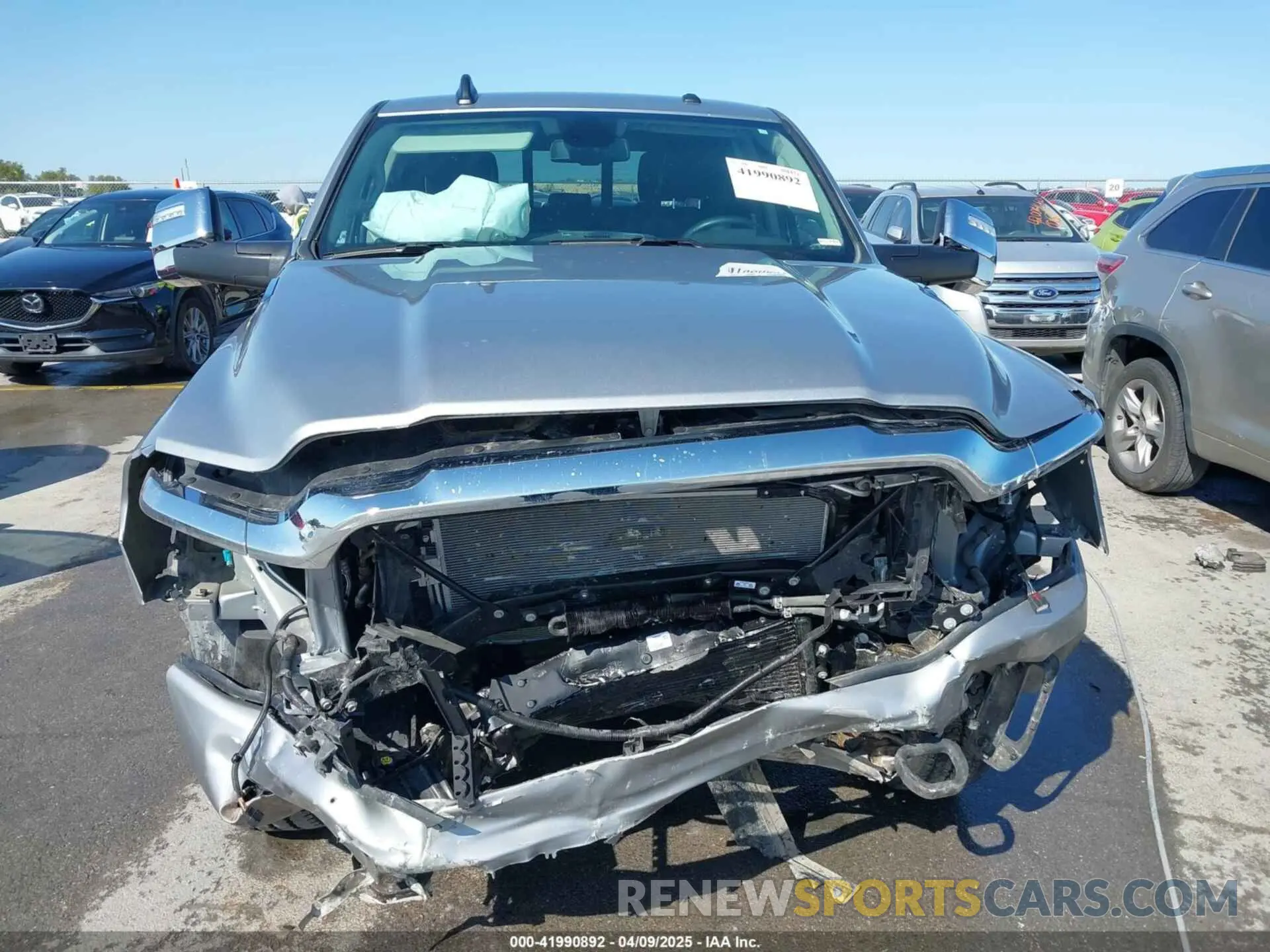 12 Photograph of a damaged car 3C6UR5FL4RG367117 RAM 2500 2024