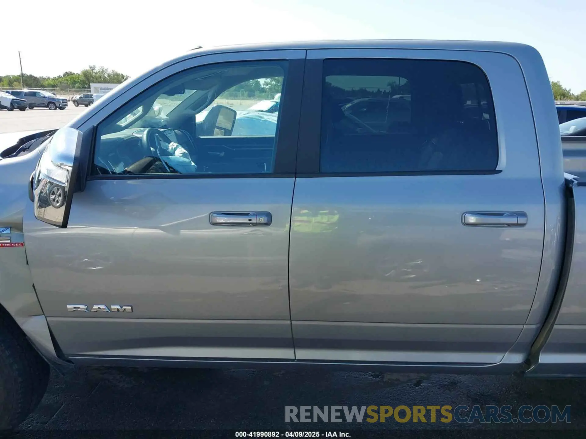 14 Photograph of a damaged car 3C6UR5FL4RG367117 RAM 2500 2024