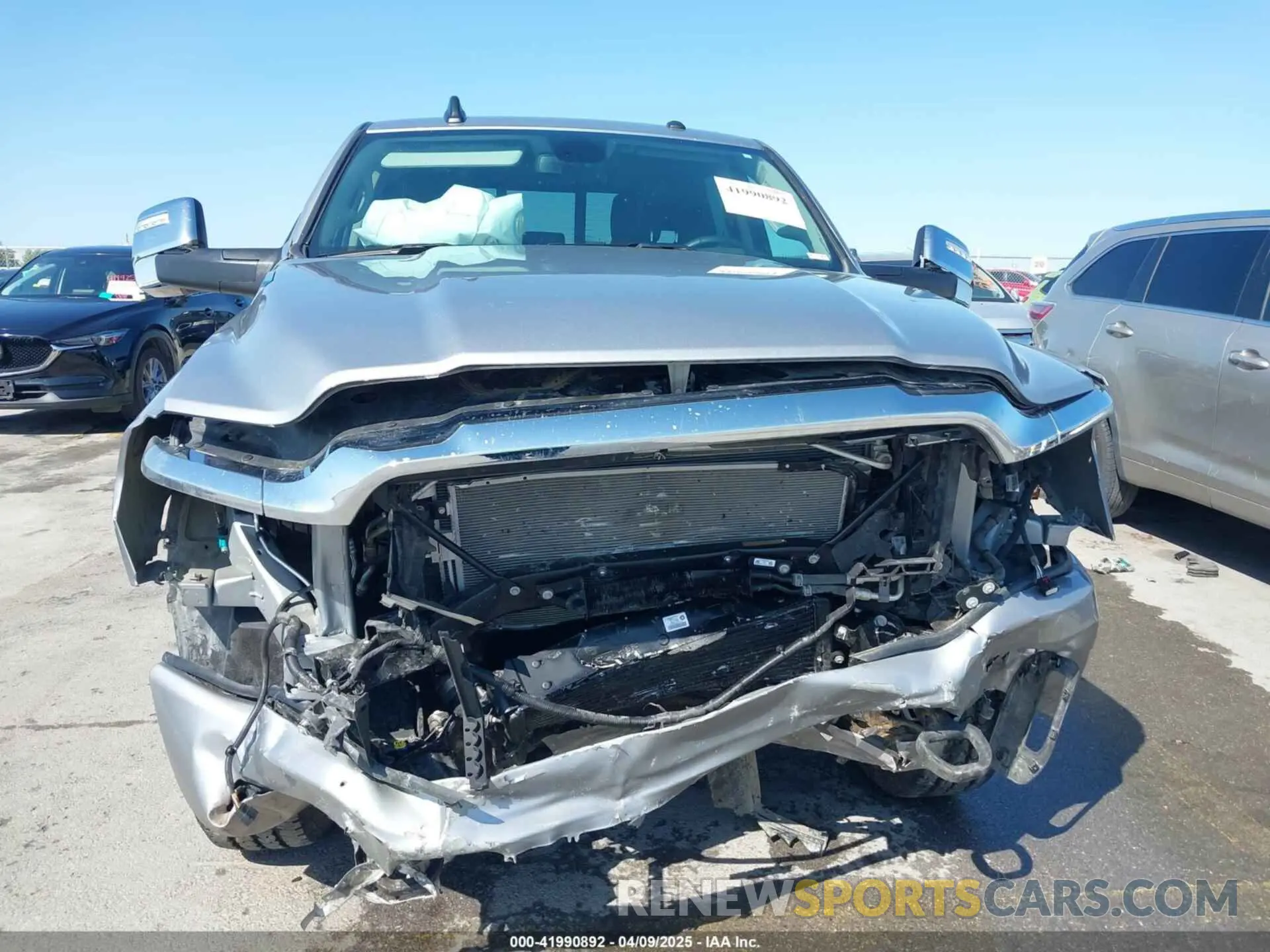 6 Photograph of a damaged car 3C6UR5FL4RG367117 RAM 2500 2024