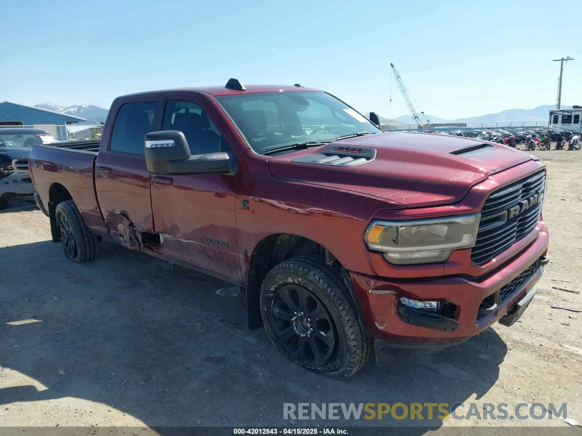 1 Photograph of a damaged car 3C6UR5FL6RG143993 RAM 2500 2024