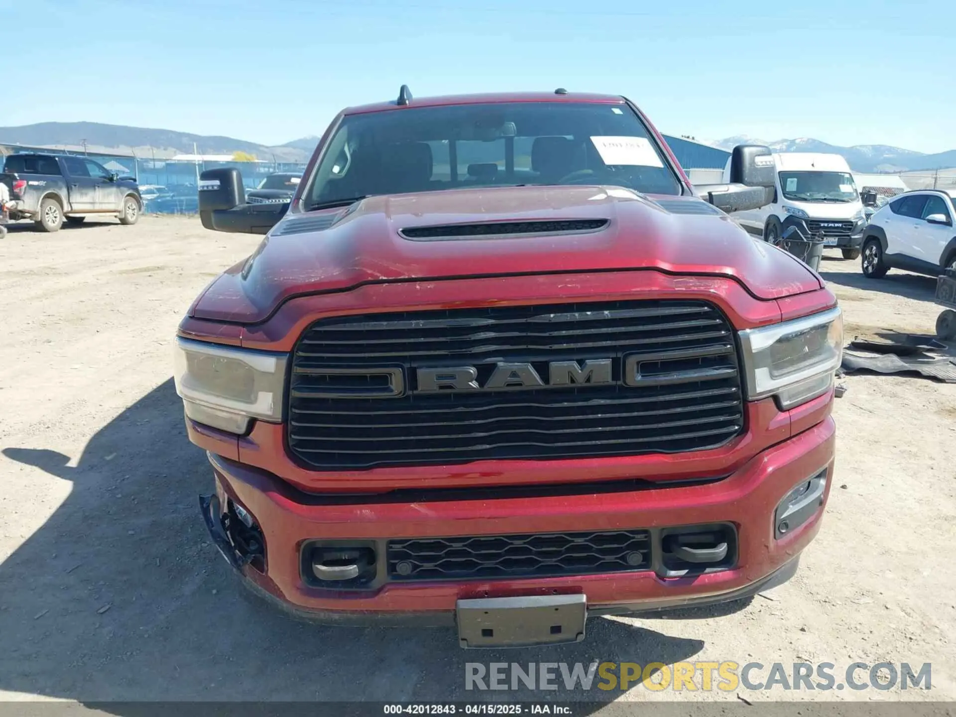 12 Photograph of a damaged car 3C6UR5FL6RG143993 RAM 2500 2024
