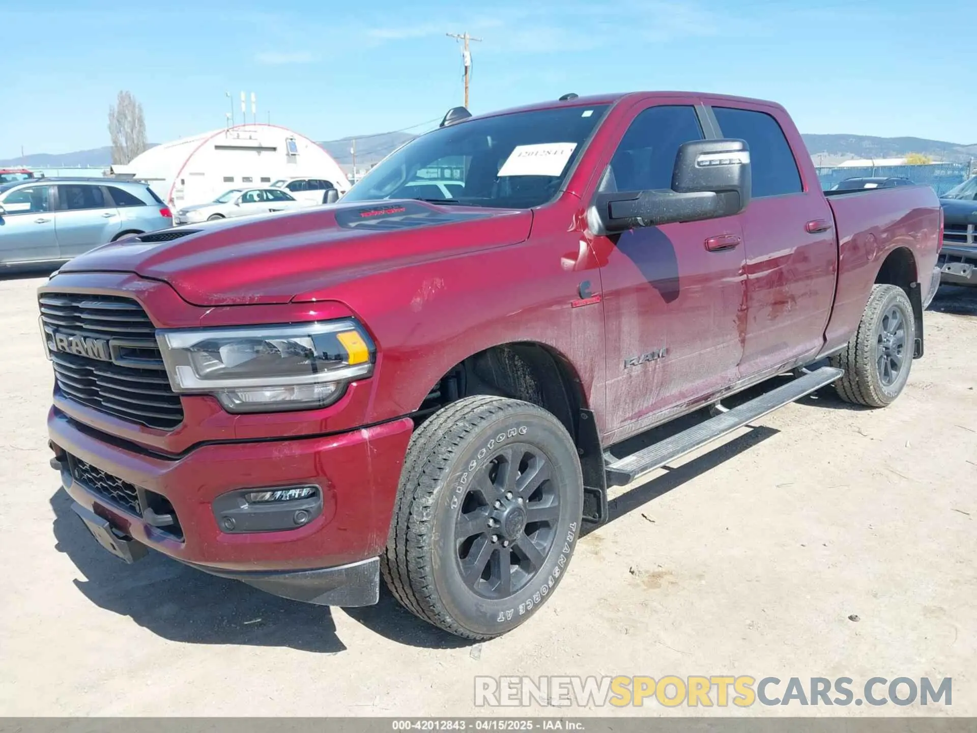 2 Photograph of a damaged car 3C6UR5FL6RG143993 RAM 2500 2024
