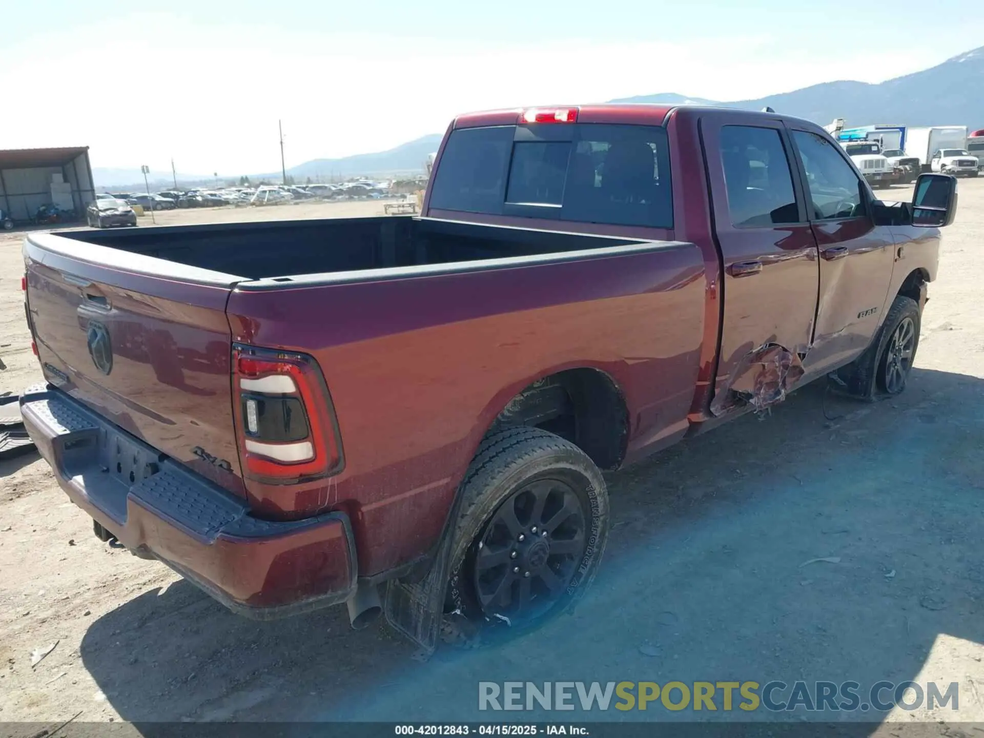 4 Photograph of a damaged car 3C6UR5FL6RG143993 RAM 2500 2024