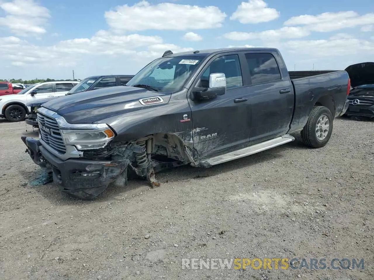 1 Photograph of a damaged car 3C6UR5FL6RG159952 RAM 2500 2024