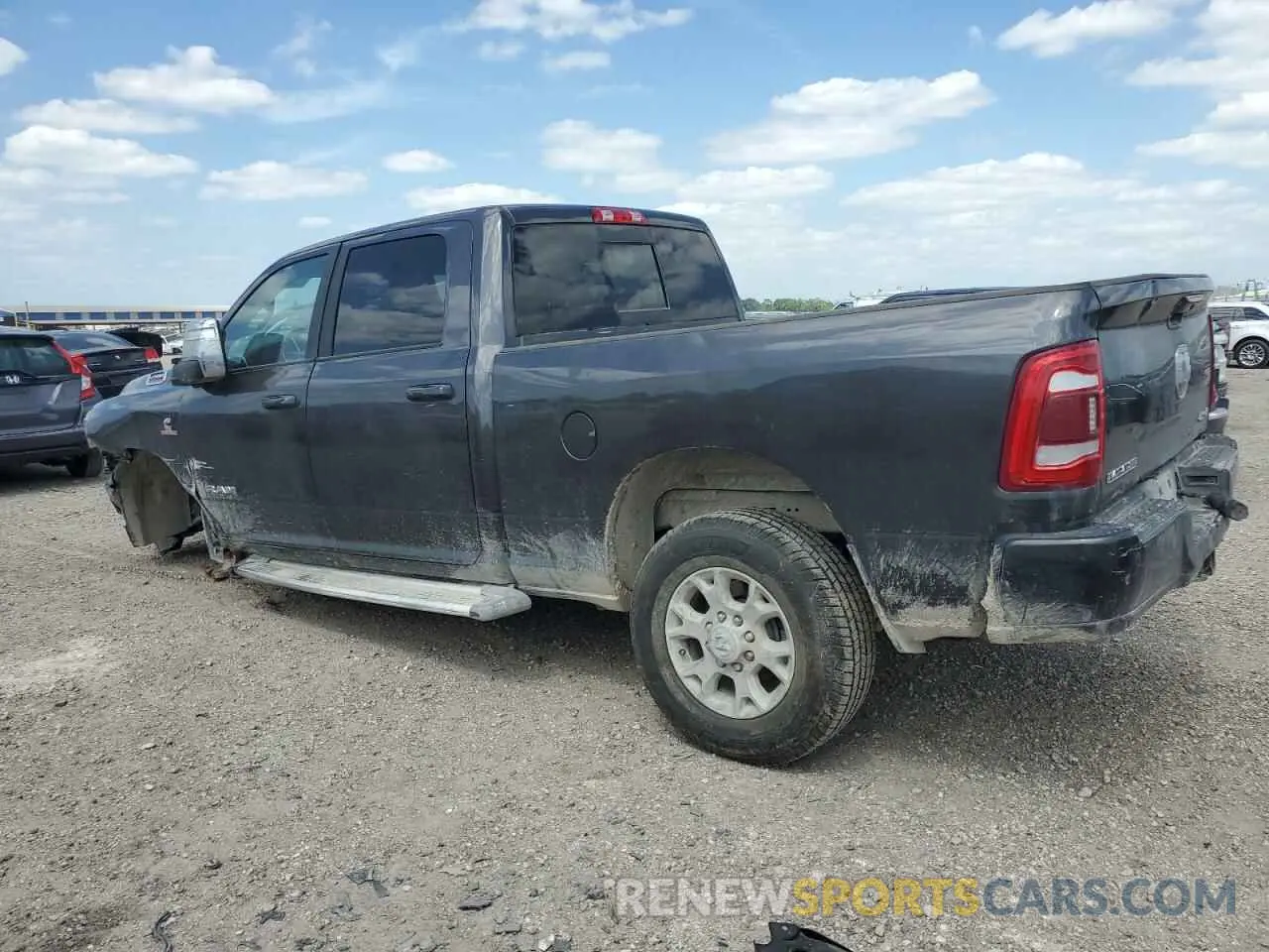 2 Photograph of a damaged car 3C6UR5FL6RG159952 RAM 2500 2024