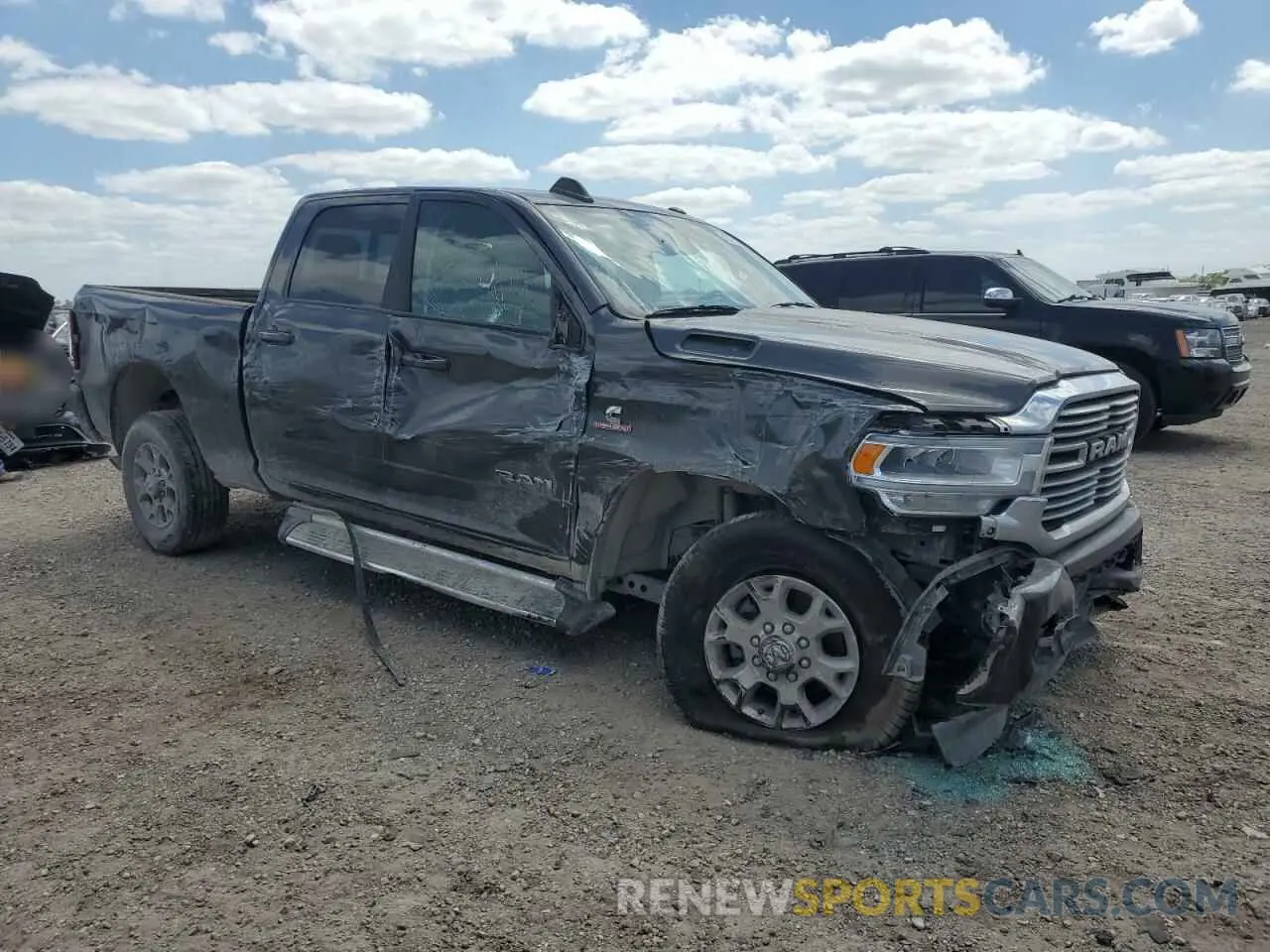 4 Photograph of a damaged car 3C6UR5FL6RG159952 RAM 2500 2024