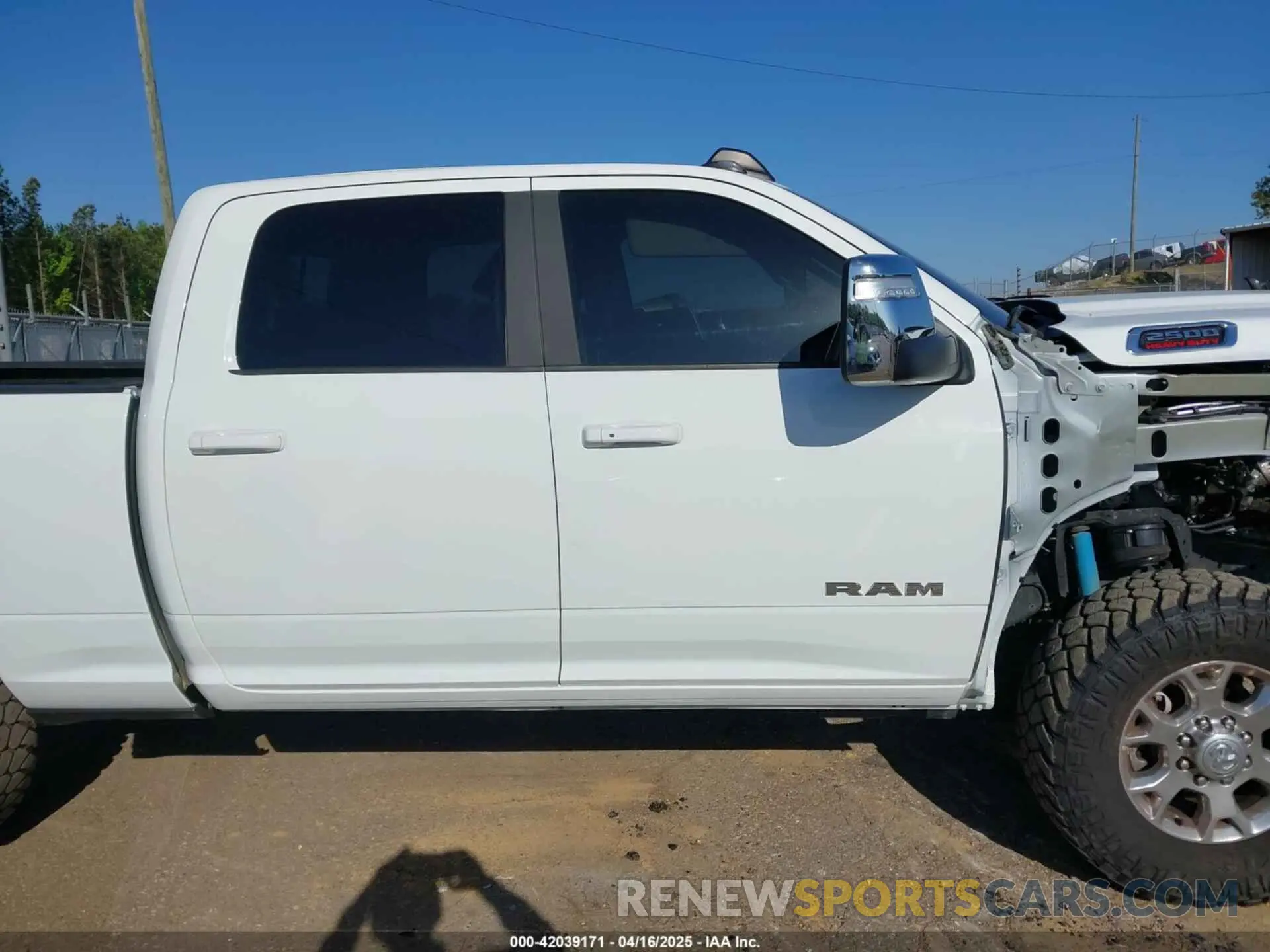 14 Photograph of a damaged car 3C6UR5FL6RG181448 RAM 2500 2024
