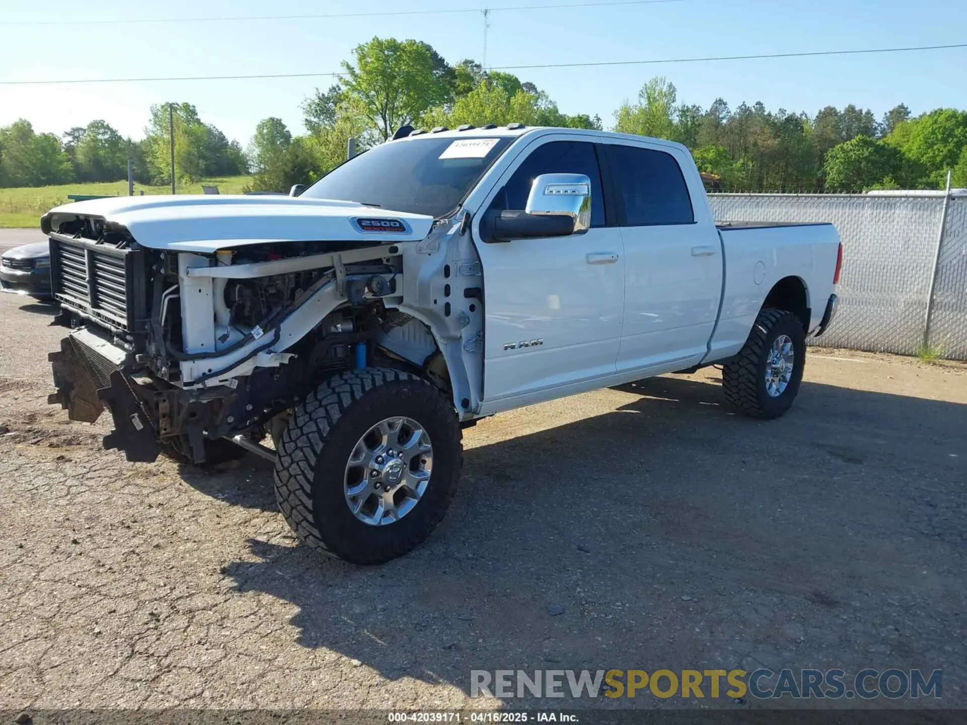 2 Photograph of a damaged car 3C6UR5FL6RG181448 RAM 2500 2024