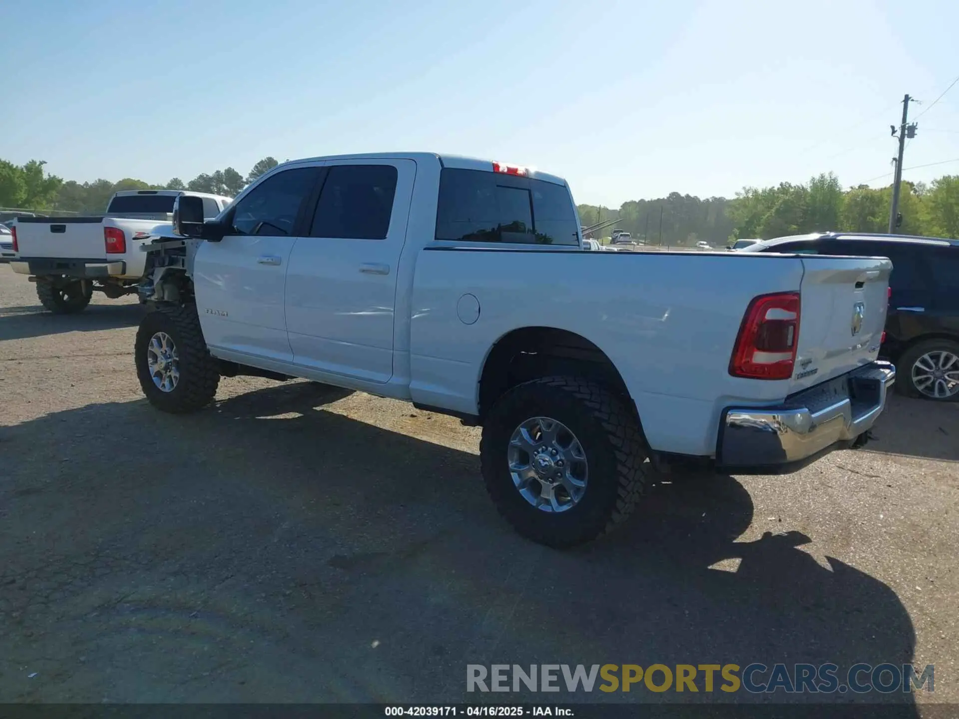 3 Photograph of a damaged car 3C6UR5FL6RG181448 RAM 2500 2024