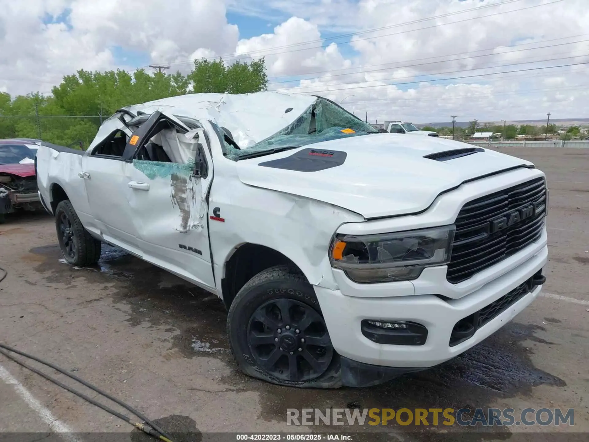12 Photograph of a damaged car 3C6UR5FL6RG288306 RAM 2500 2024