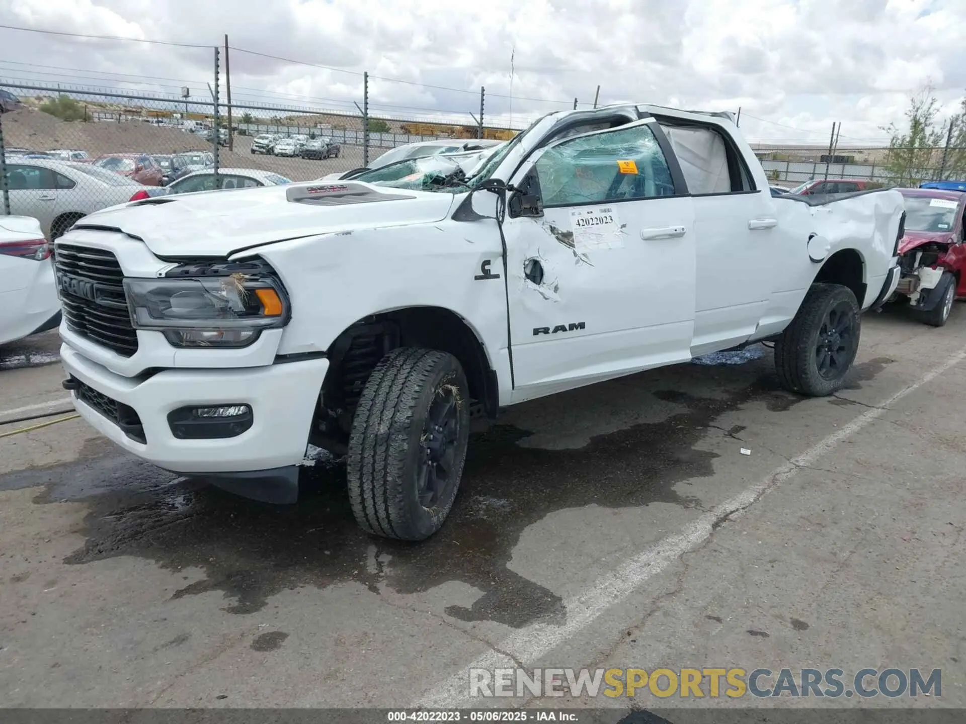 2 Photograph of a damaged car 3C6UR5FL6RG288306 RAM 2500 2024