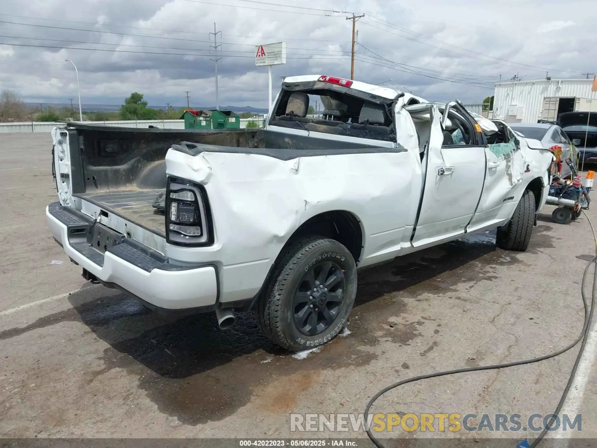 4 Photograph of a damaged car 3C6UR5FL6RG288306 RAM 2500 2024