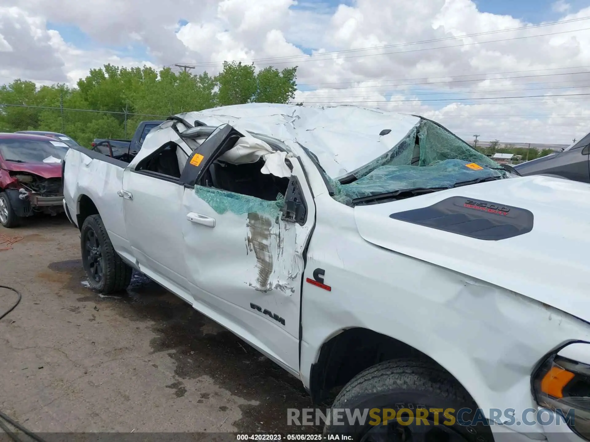 6 Photograph of a damaged car 3C6UR5FL6RG288306 RAM 2500 2024