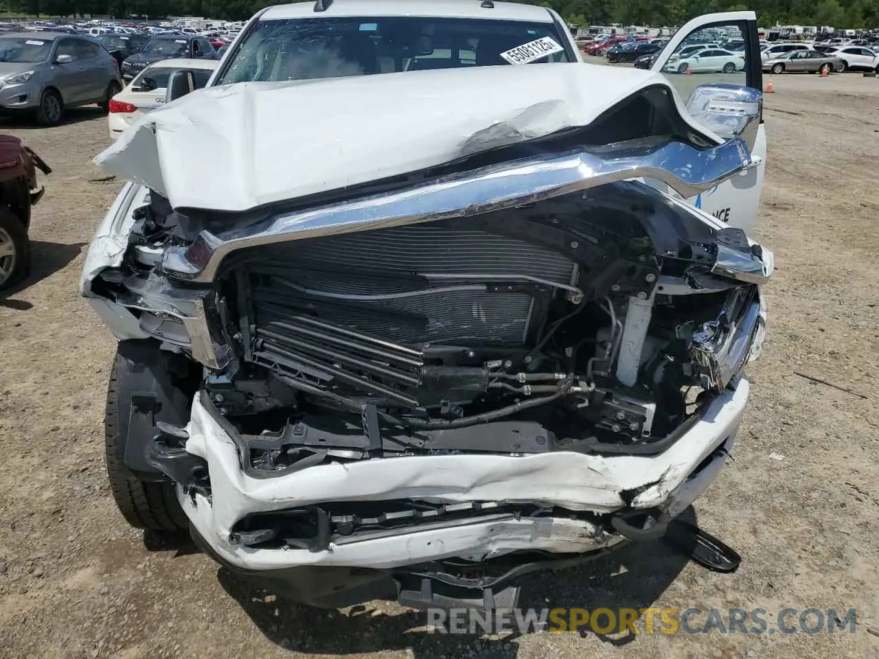 11 Photograph of a damaged car 3C6UR5FL6RG366874 RAM 2500 2024