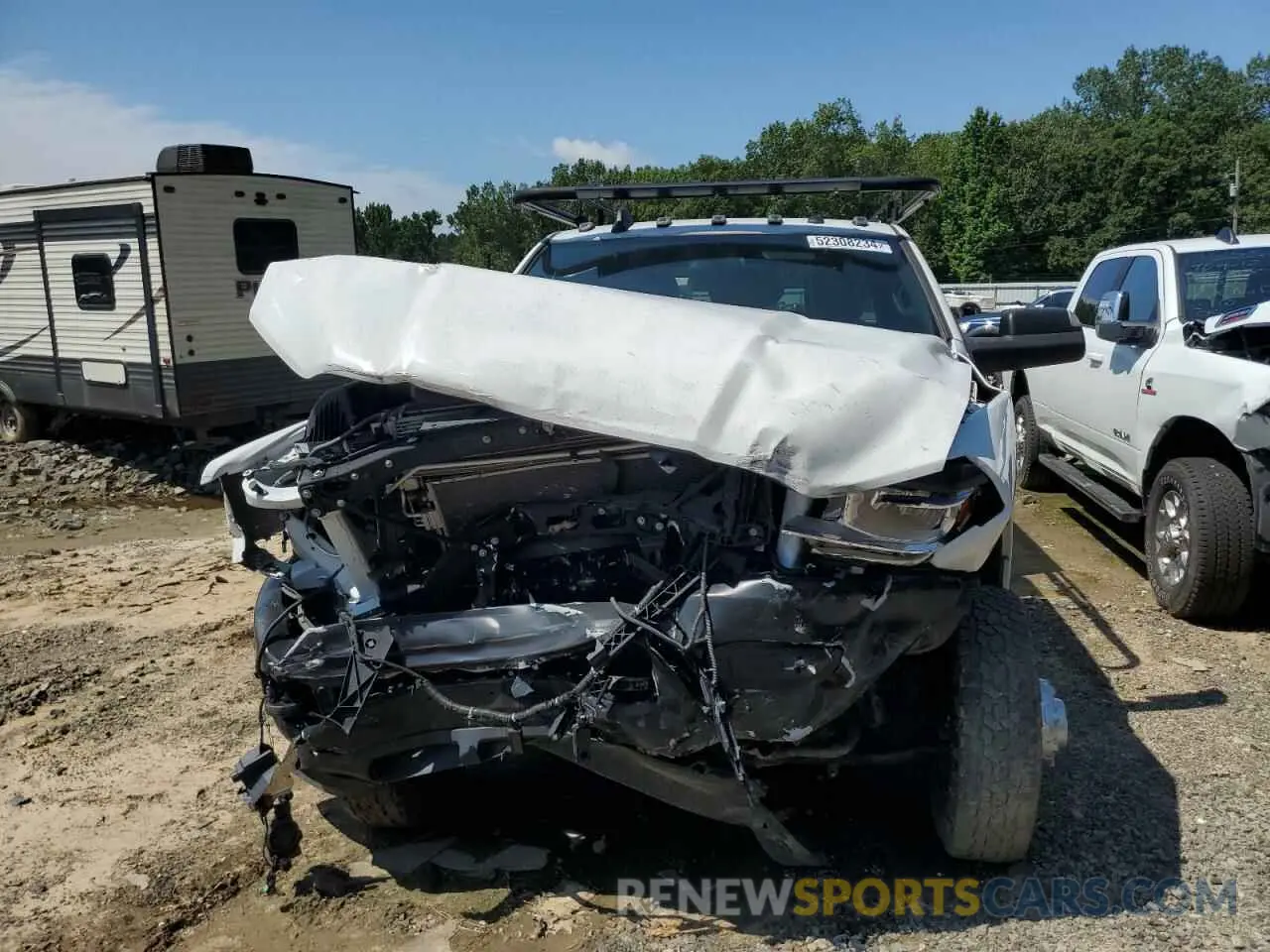 5 Photograph of a damaged car 3C6UR5FL6RG366874 RAM 2500 2024