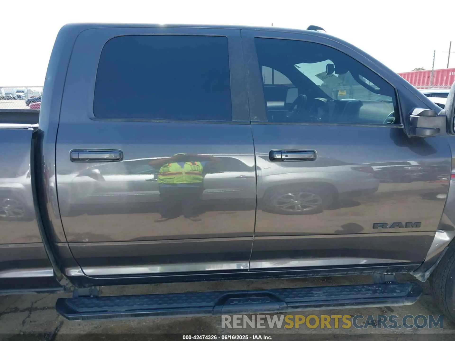 14 Photograph of a damaged car 3C6UR5FL8RG281857 RAM 2500 2024