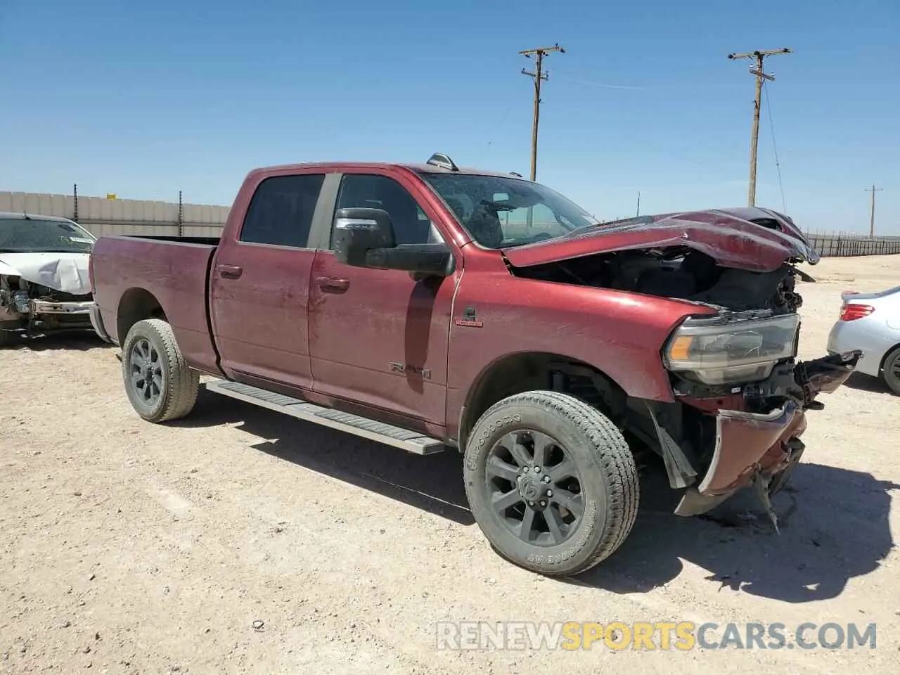 4 Photograph of a damaged car 3C6UR5FL9RG162974 RAM 2500 2024
