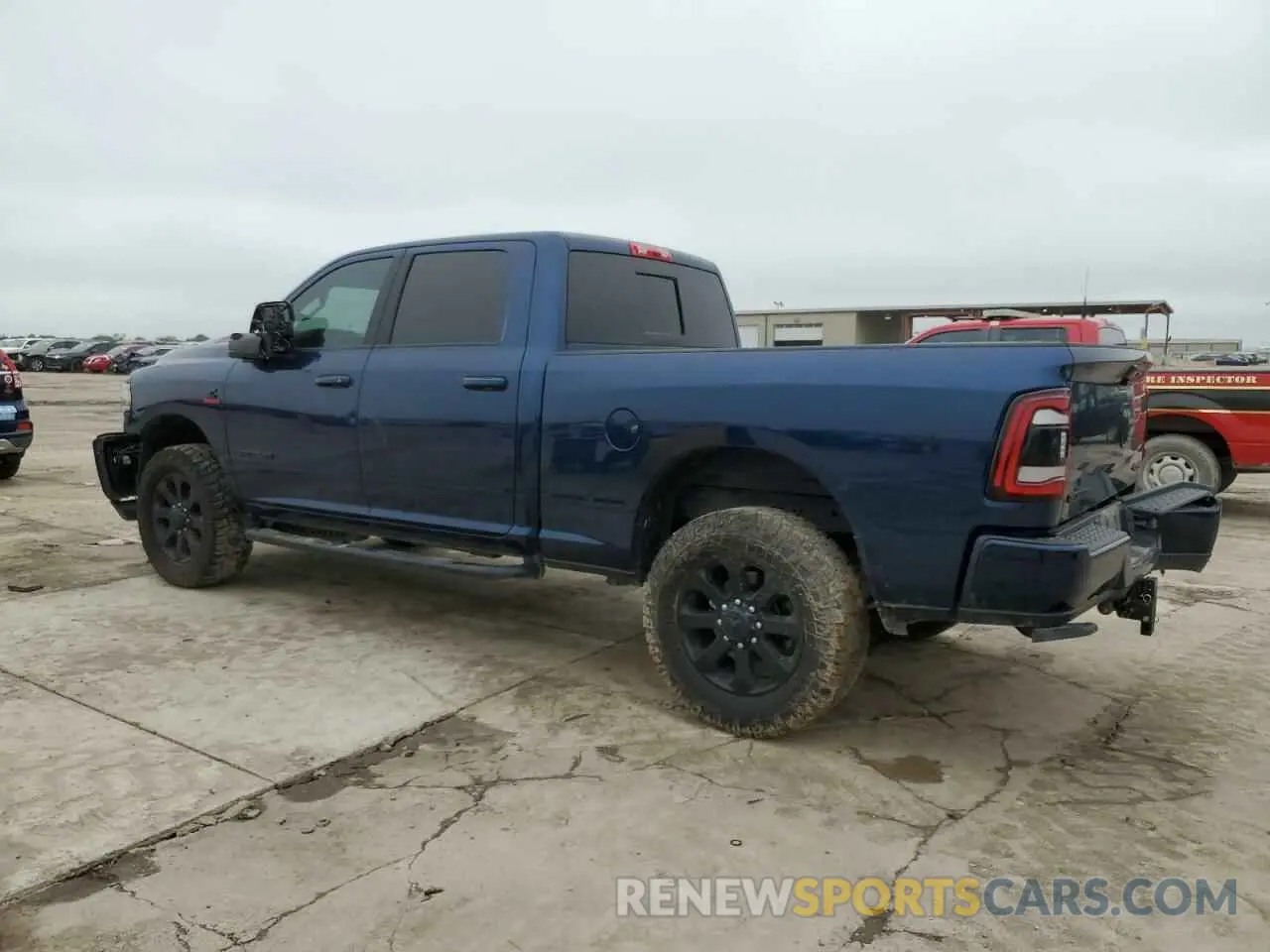 2 Photograph of a damaged car 3C6UR5FL9RG278143 RAM 2500 2024