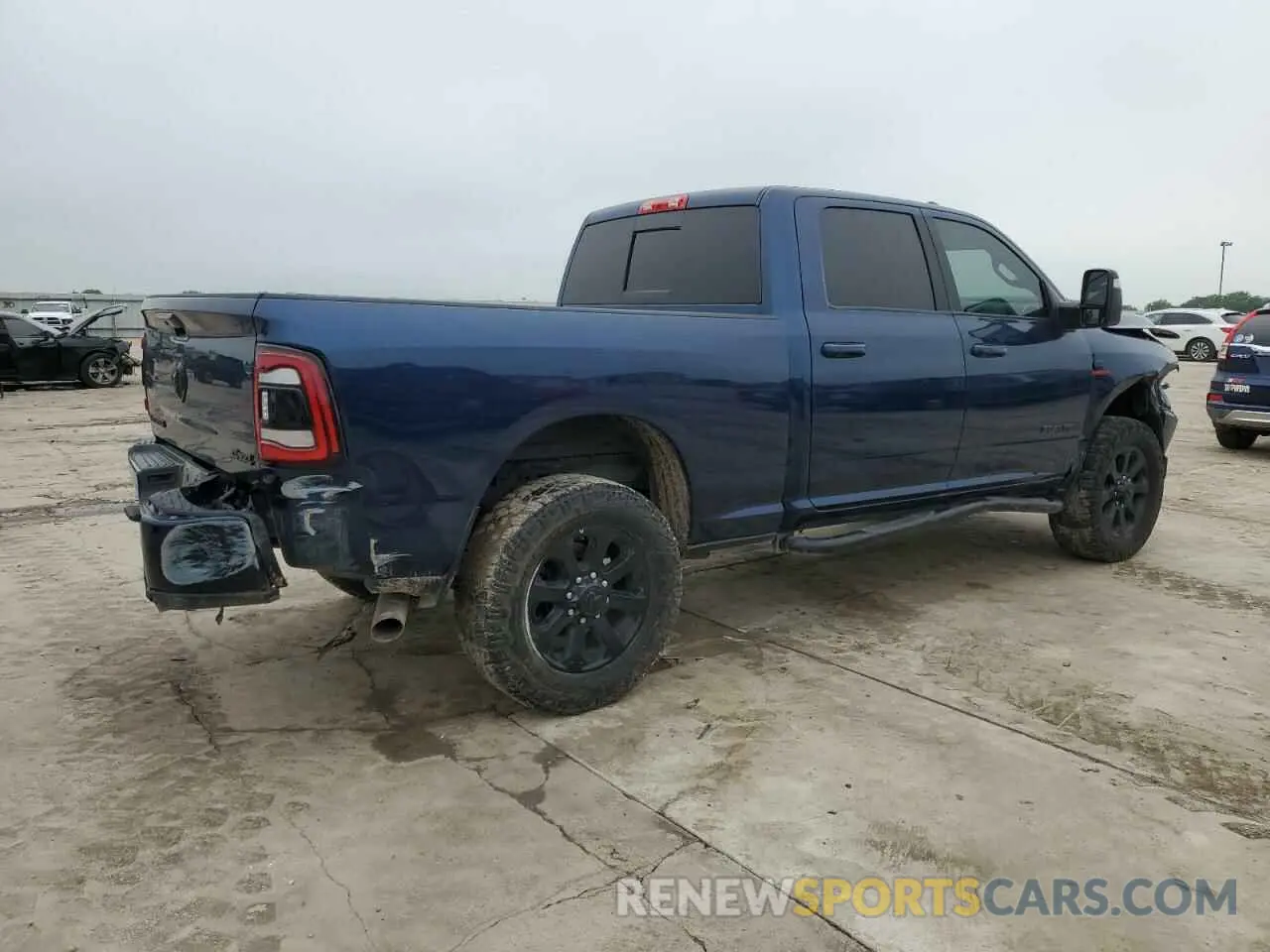 3 Photograph of a damaged car 3C6UR5FL9RG278143 RAM 2500 2024