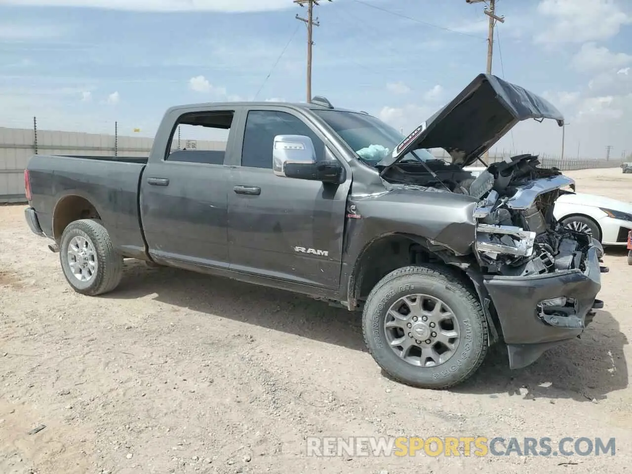4 Photograph of a damaged car 3C6UR5FL9RG355268 RAM 2500 2024