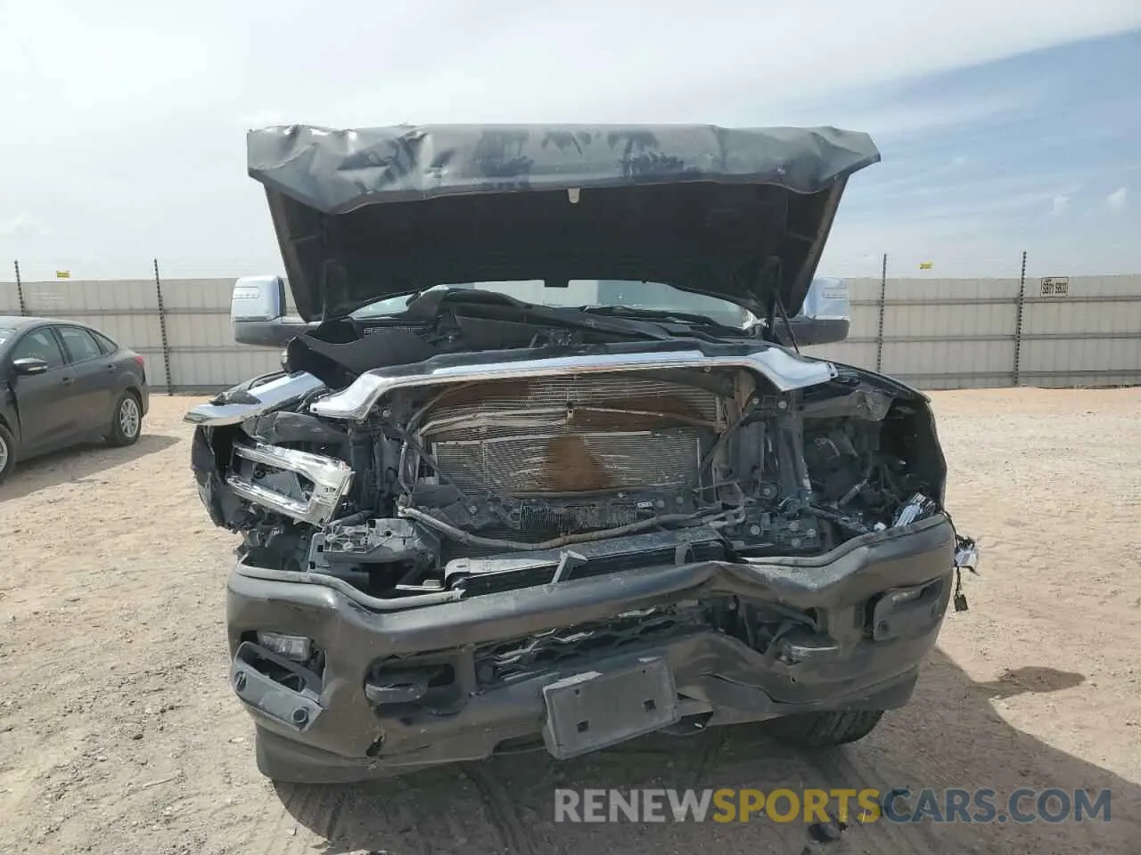 5 Photograph of a damaged car 3C6UR5FL9RG355268 RAM 2500 2024