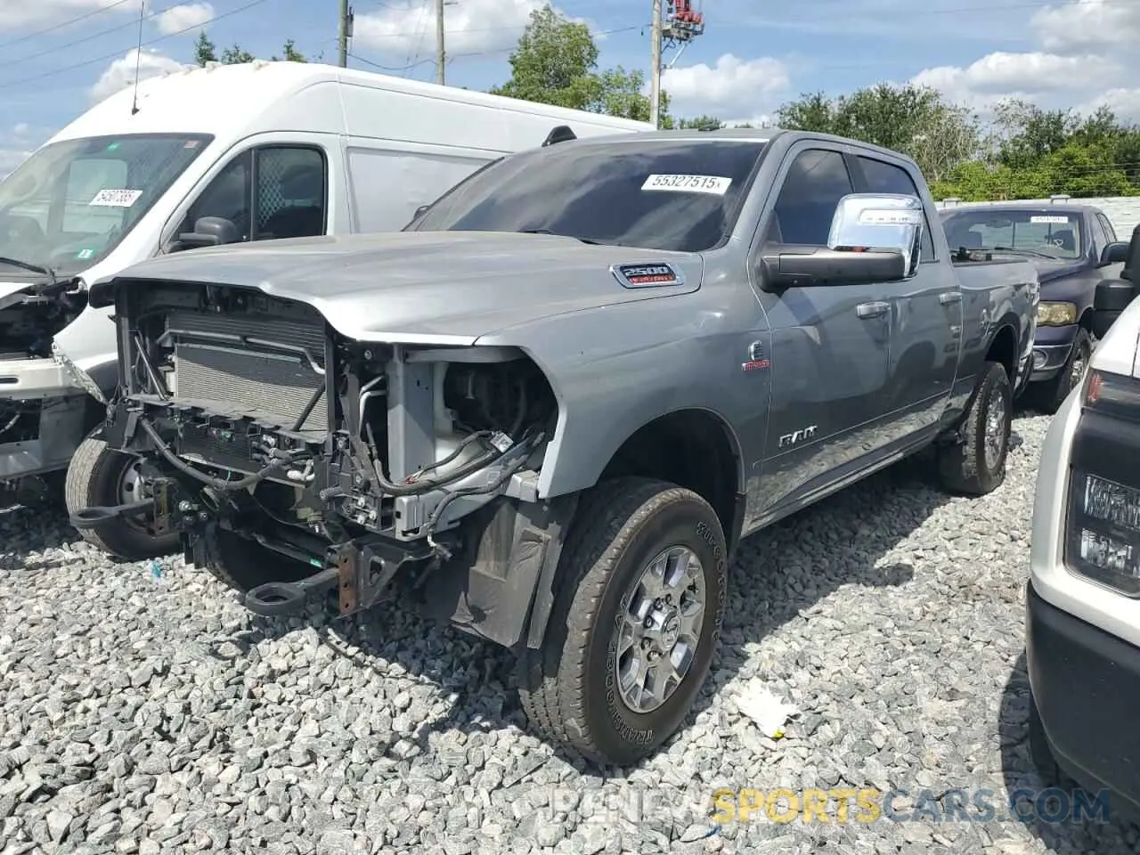 1 Photograph of a damaged car 3C6UR5FLXRG104906 RAM 2500 2024