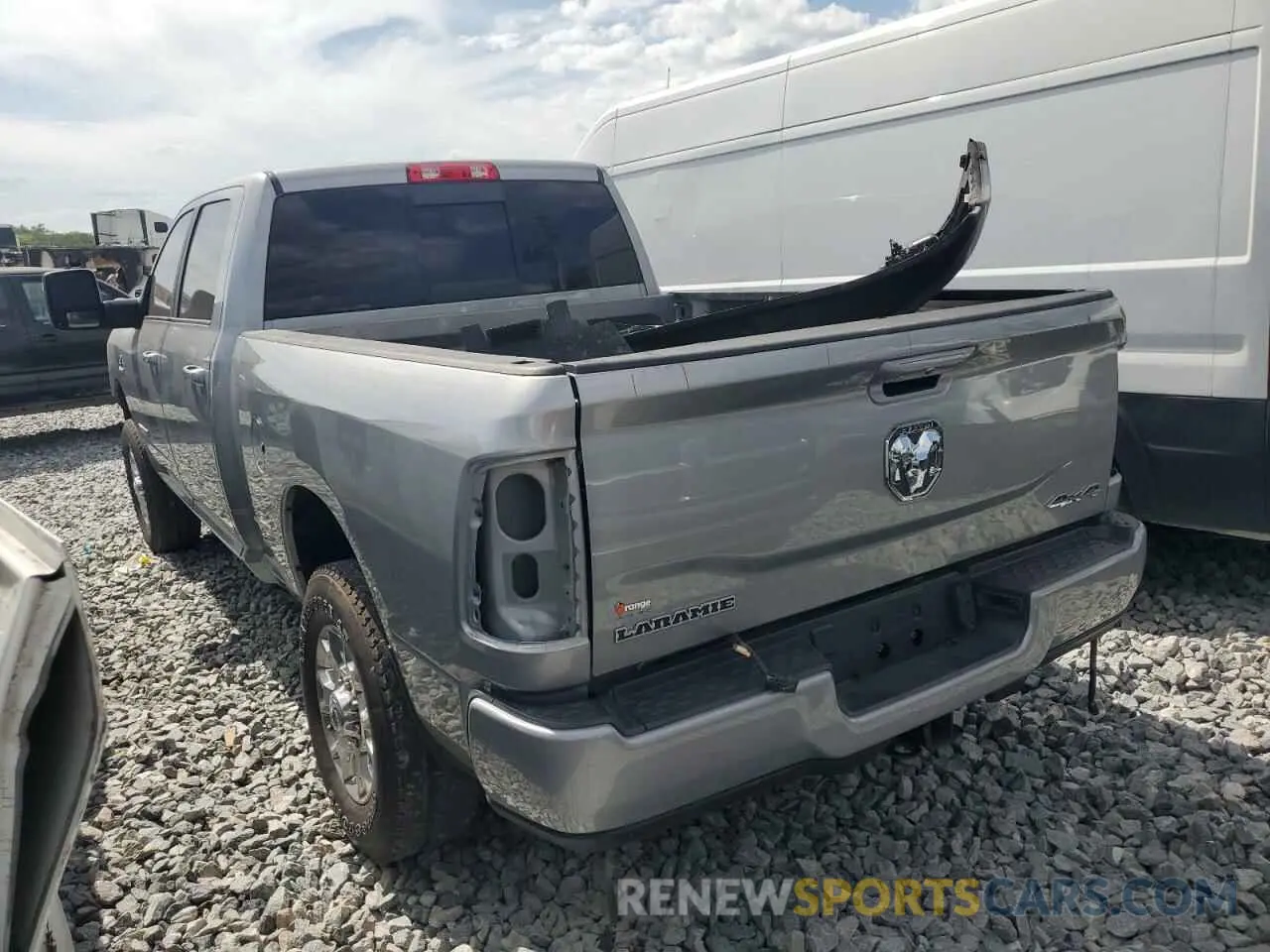 2 Photograph of a damaged car 3C6UR5FLXRG104906 RAM 2500 2024
