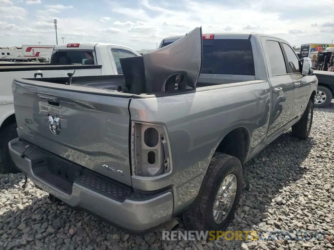 3 Photograph of a damaged car 3C6UR5FLXRG104906 RAM 2500 2024
