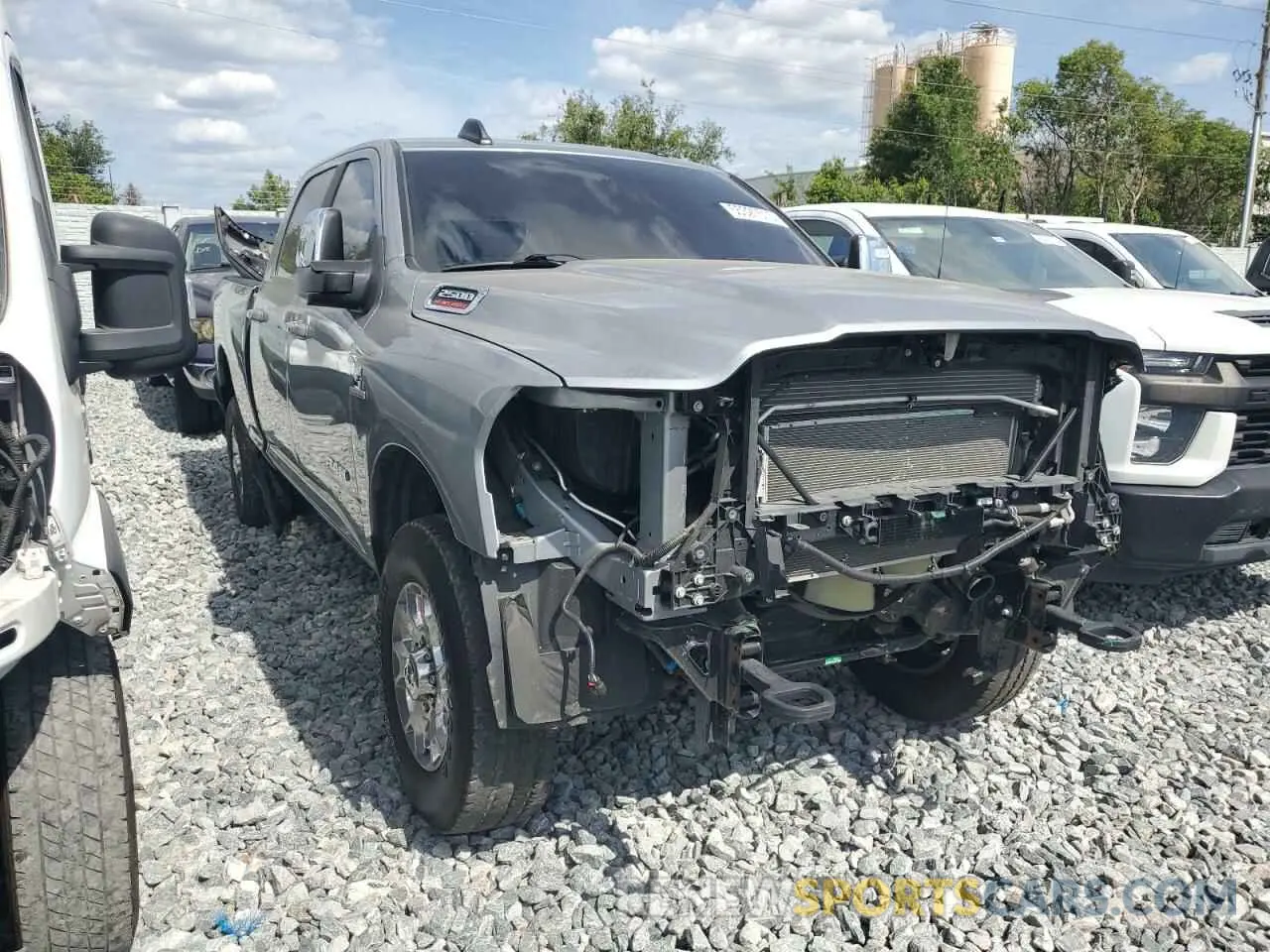 4 Photograph of a damaged car 3C6UR5FLXRG104906 RAM 2500 2024