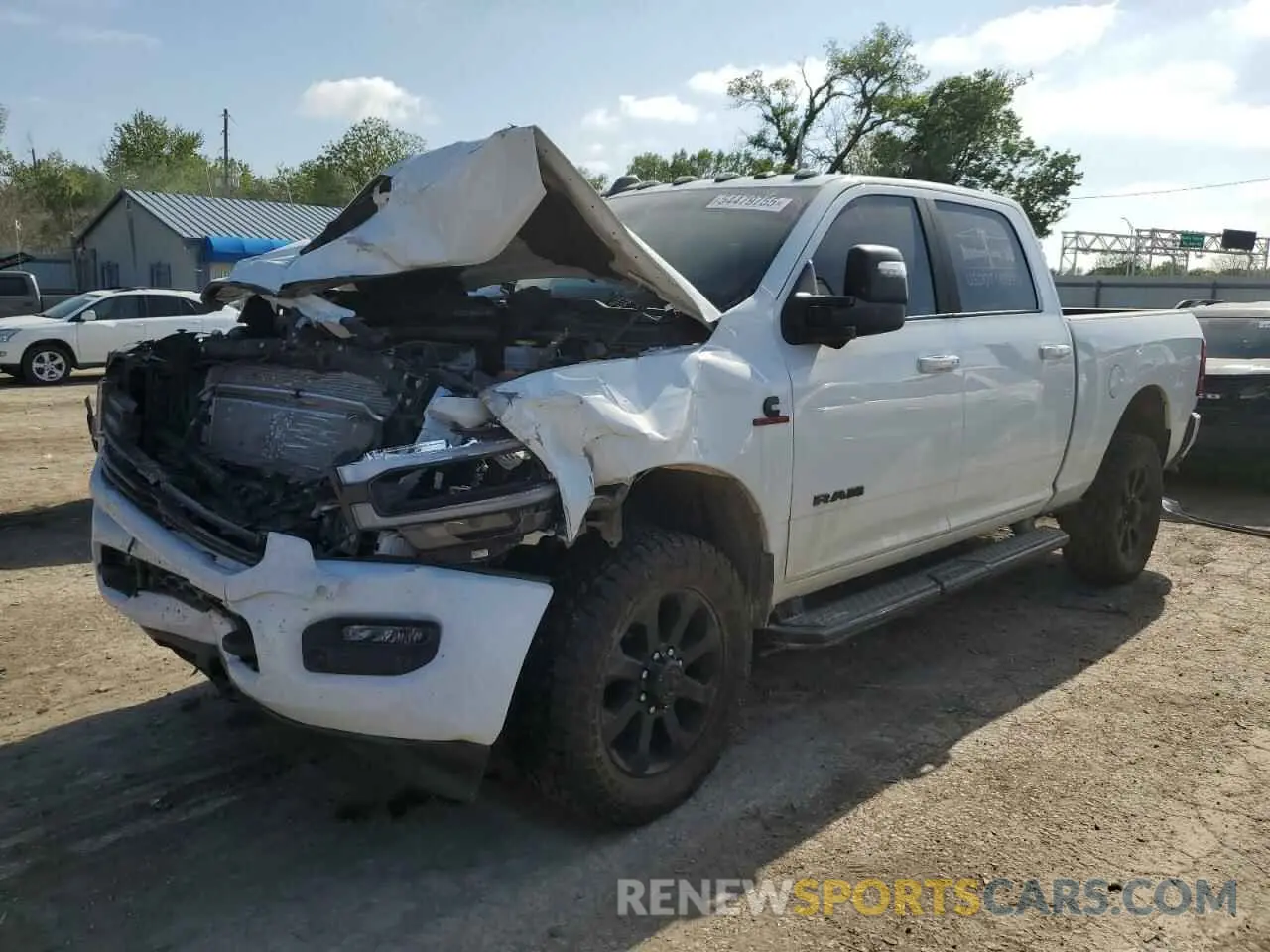 1 Photograph of a damaged car 3C6UR5FLXRG202740 RAM 2500 2024