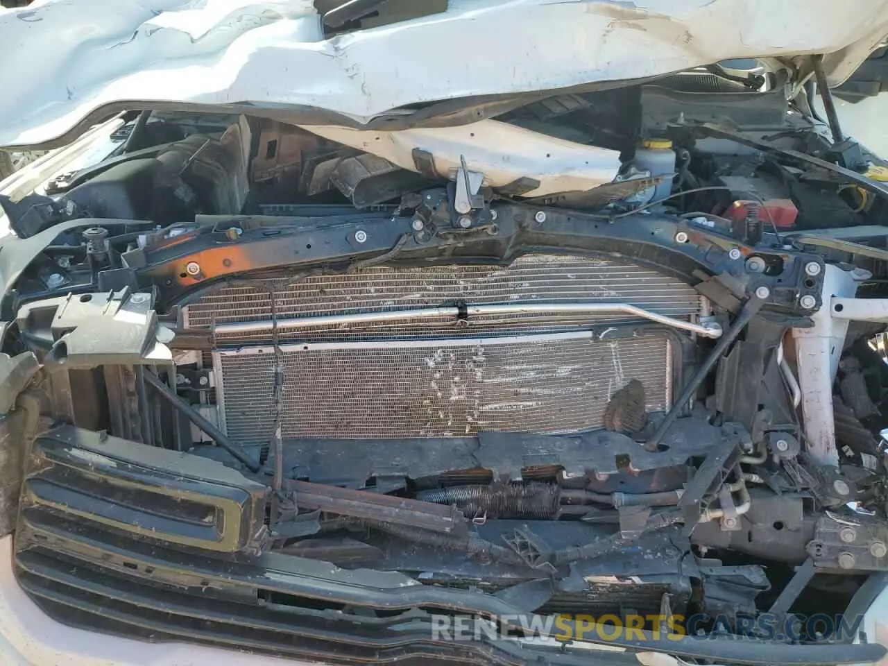 11 Photograph of a damaged car 3C6UR5FLXRG202740 RAM 2500 2024