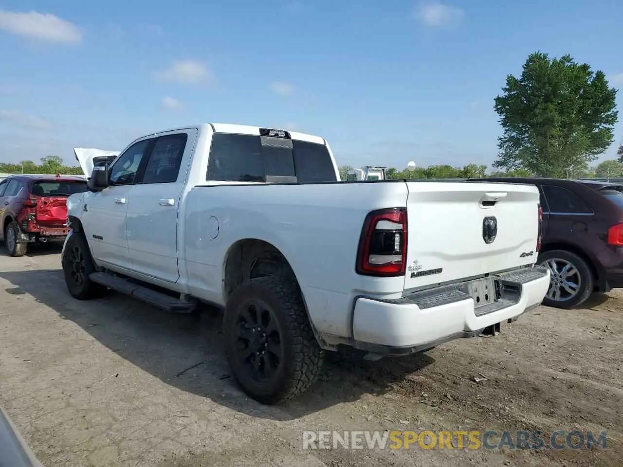 2 Photograph of a damaged car 3C6UR5FLXRG202740 RAM 2500 2024