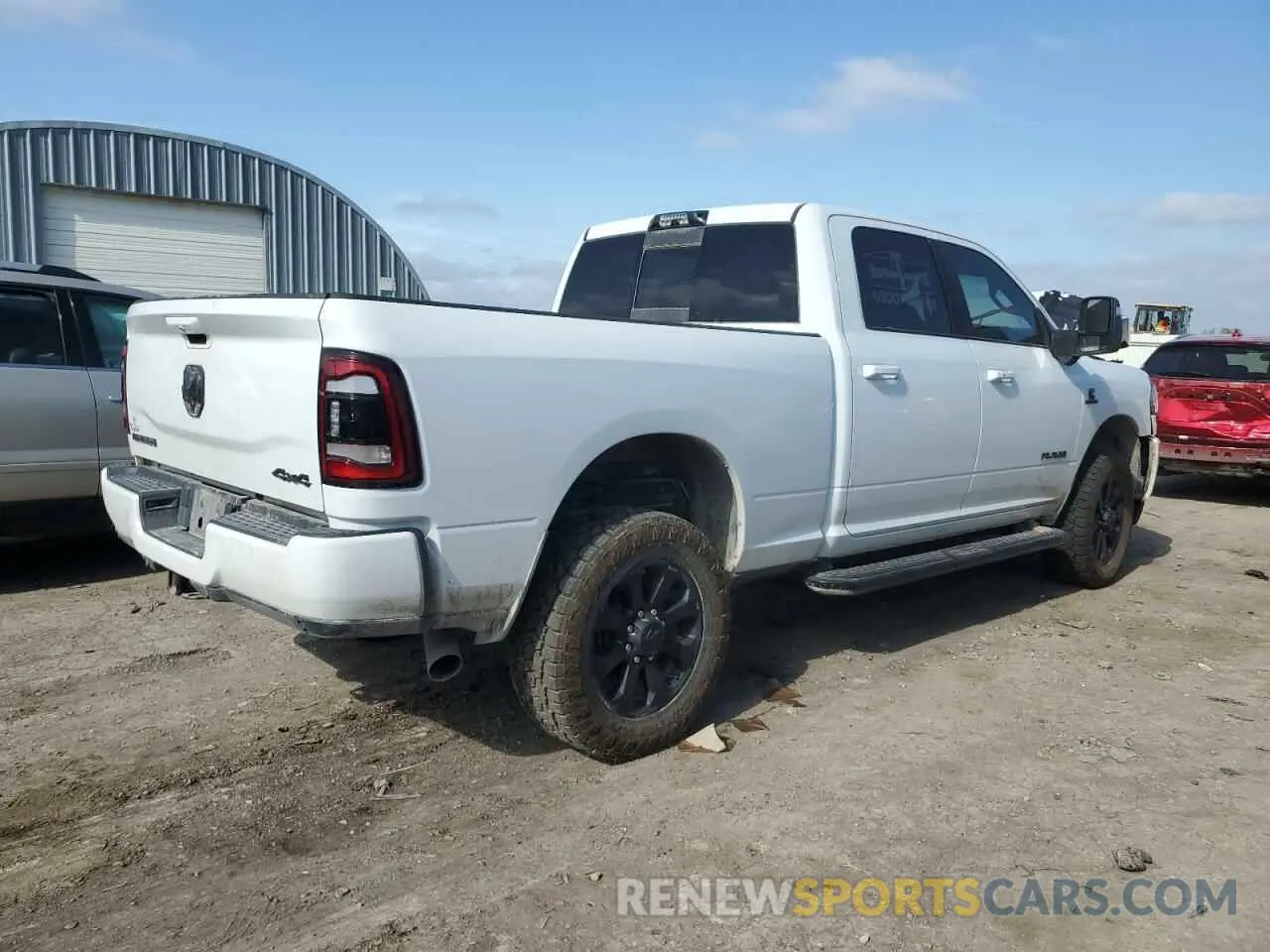 3 Photograph of a damaged car 3C6UR5FLXRG202740 RAM 2500 2024
