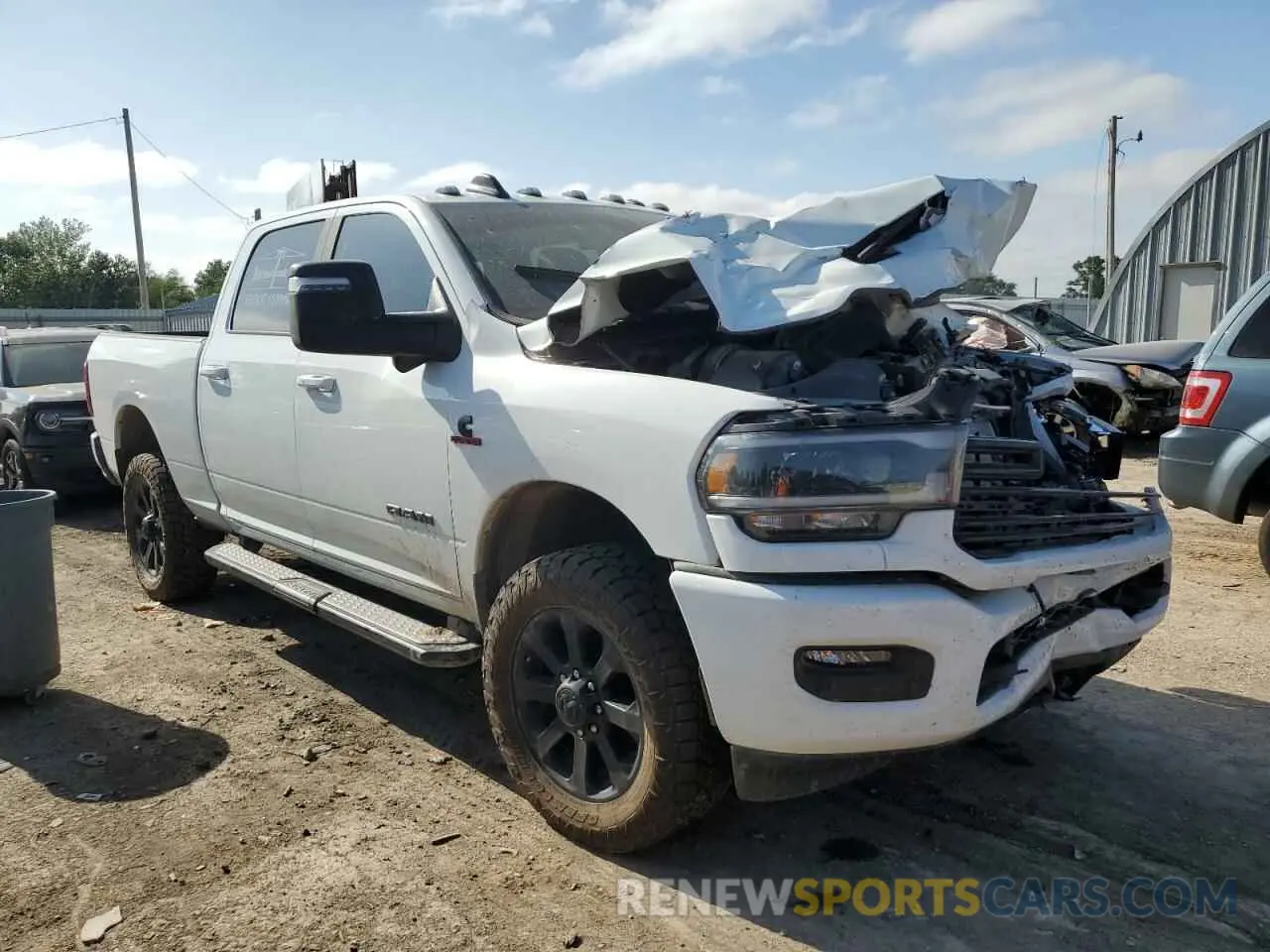 4 Photograph of a damaged car 3C6UR5FLXRG202740 RAM 2500 2024