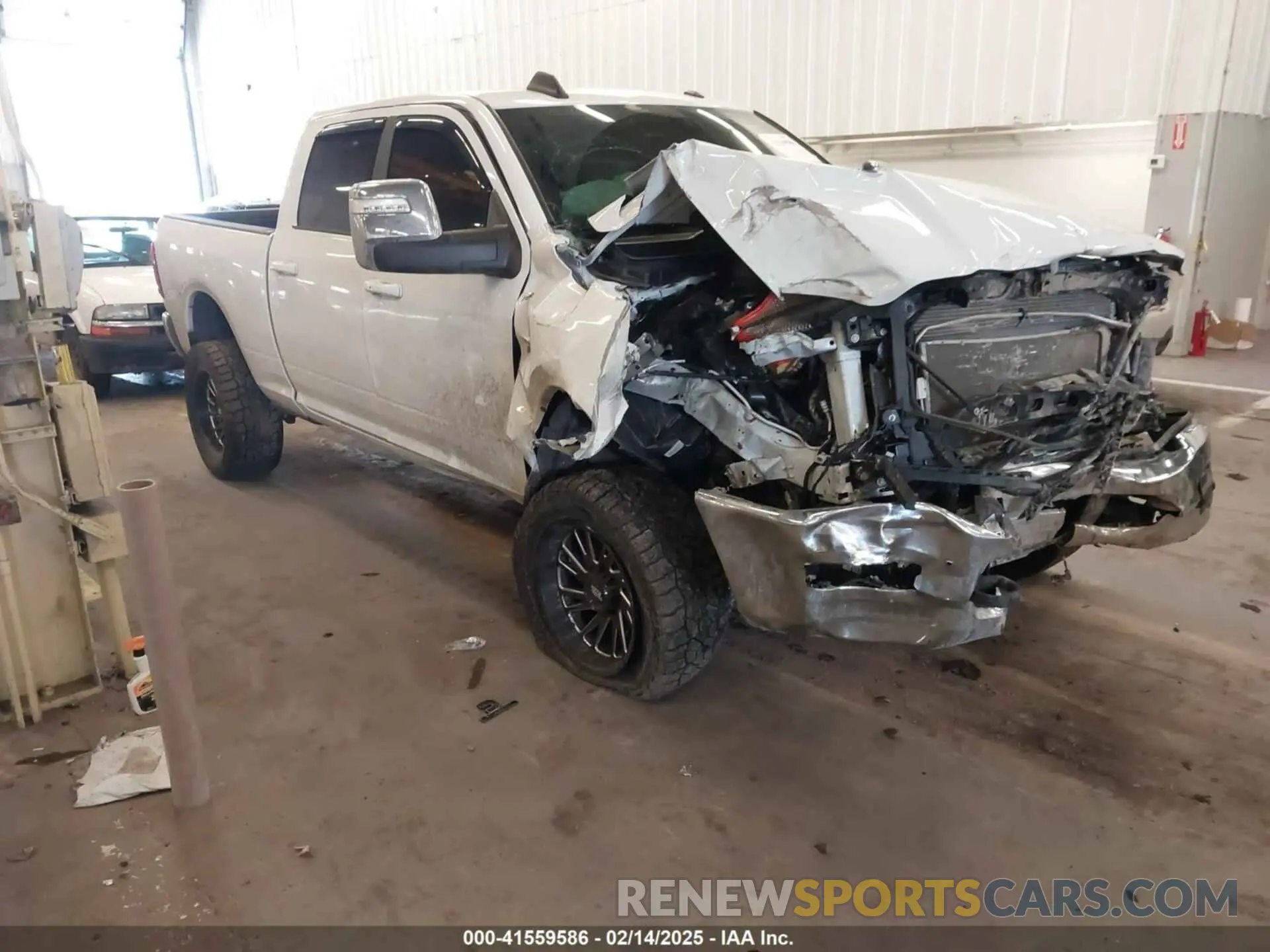 1 Photograph of a damaged car 3C6UR5FLXRG213074 RAM 2500 2024