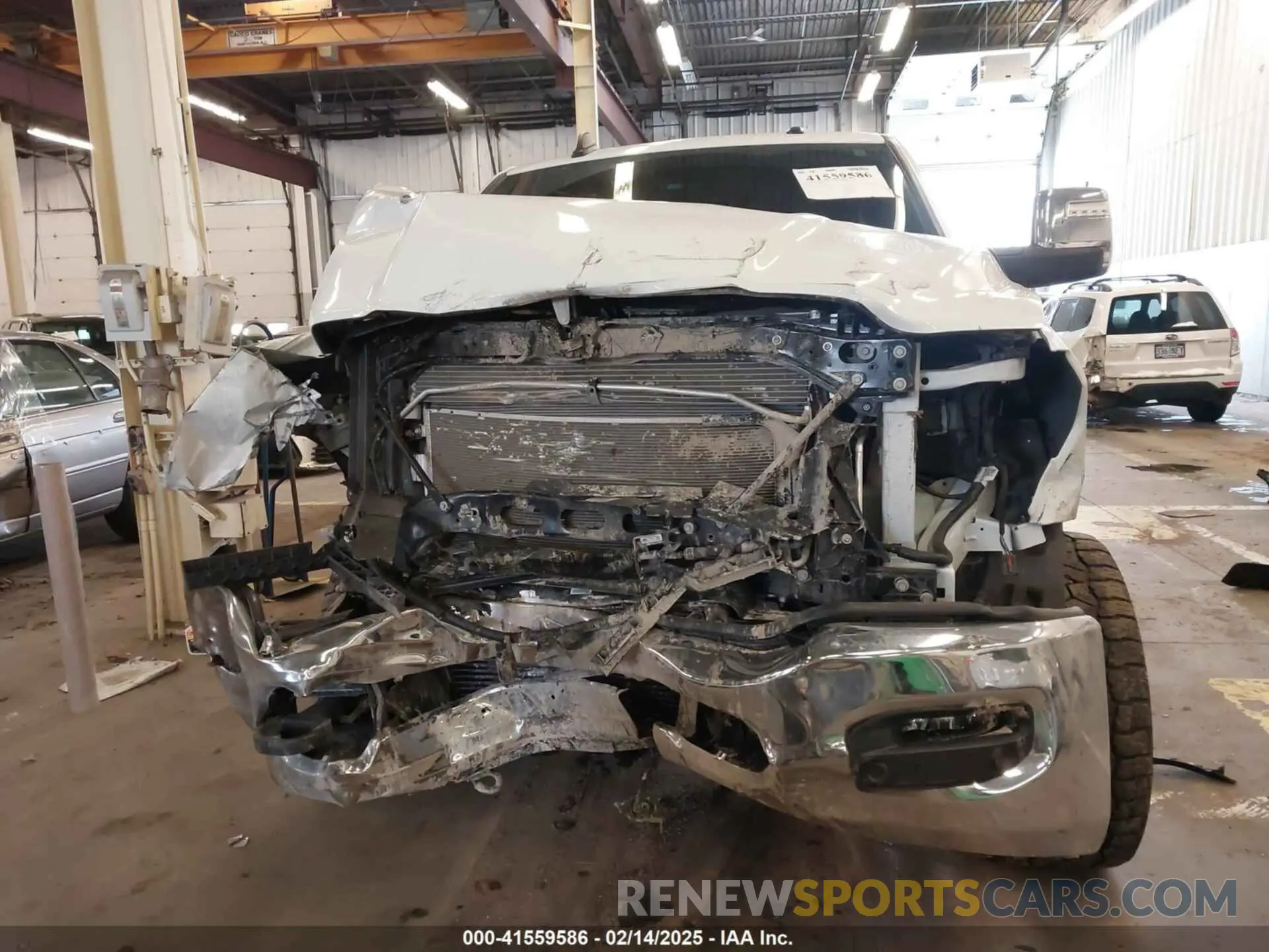 12 Photograph of a damaged car 3C6UR5FLXRG213074 RAM 2500 2024