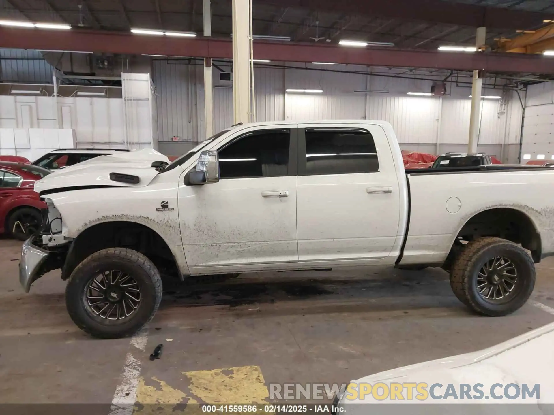 14 Photograph of a damaged car 3C6UR5FLXRG213074 RAM 2500 2024