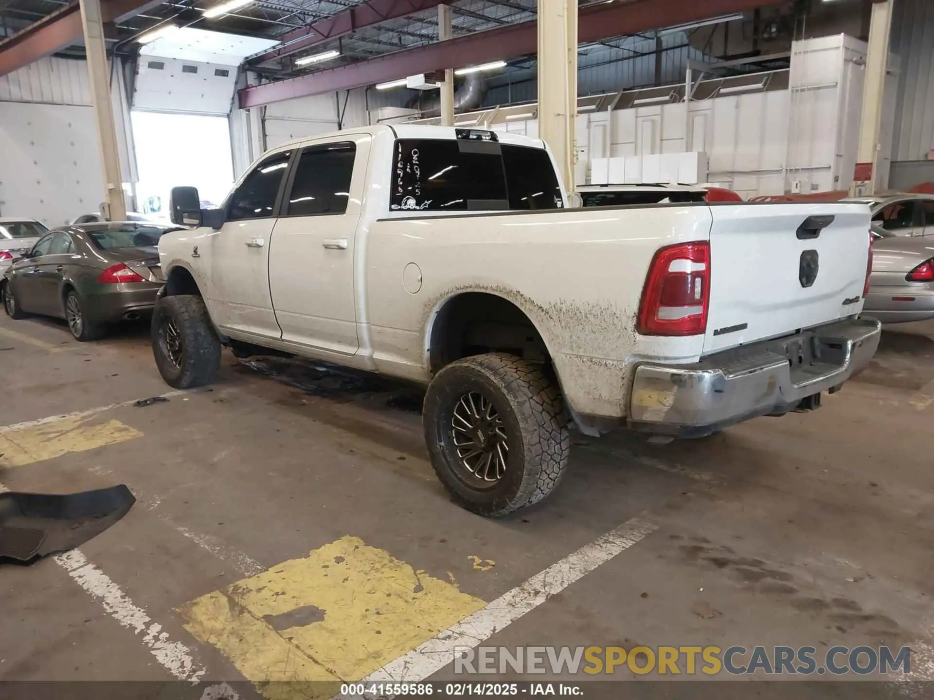 3 Photograph of a damaged car 3C6UR5FLXRG213074 RAM 2500 2024