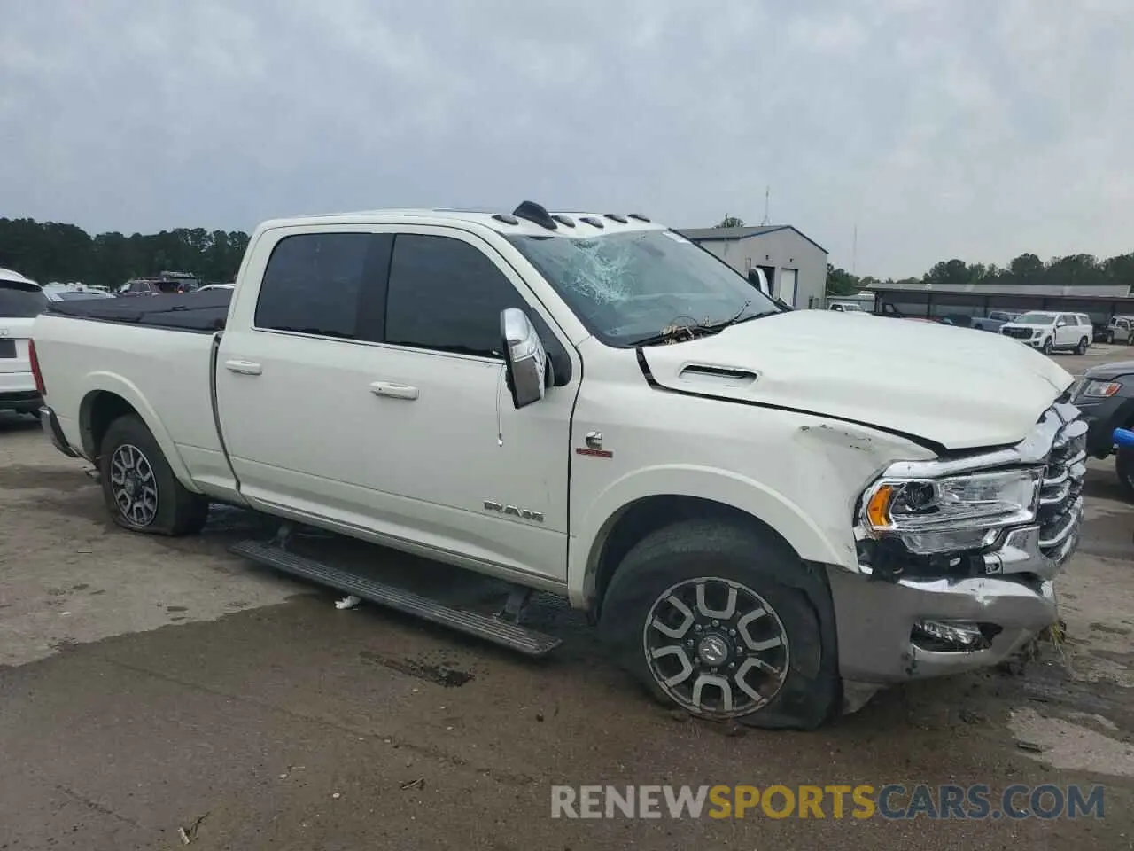 4 Photograph of a damaged car 3C6UR5GL4RG127824 RAM 2500 2024