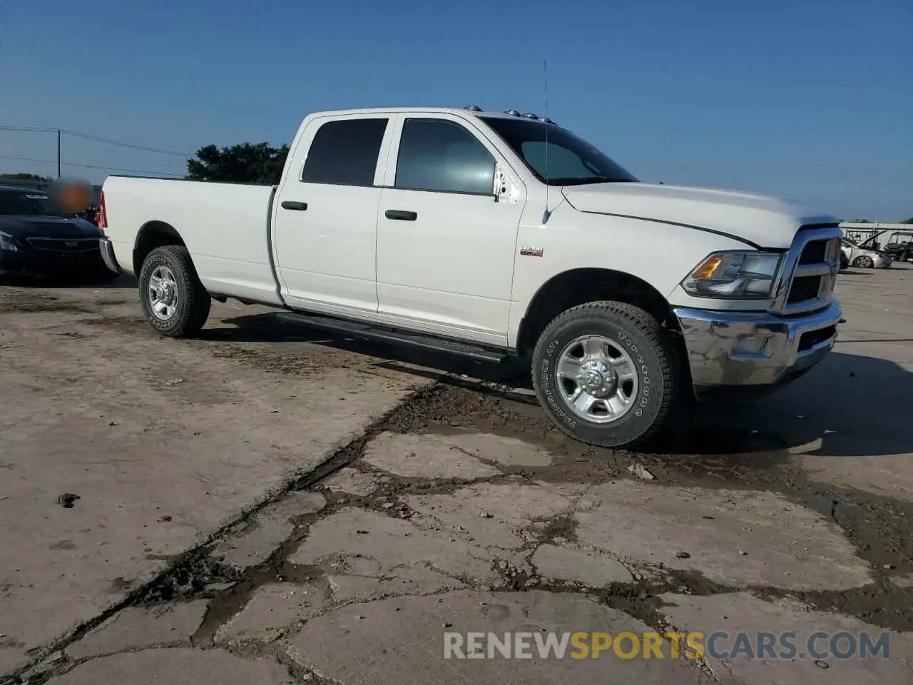 4 Photograph of a damaged car 3C6UR5HJ2RG230415 RAM 2500 2024