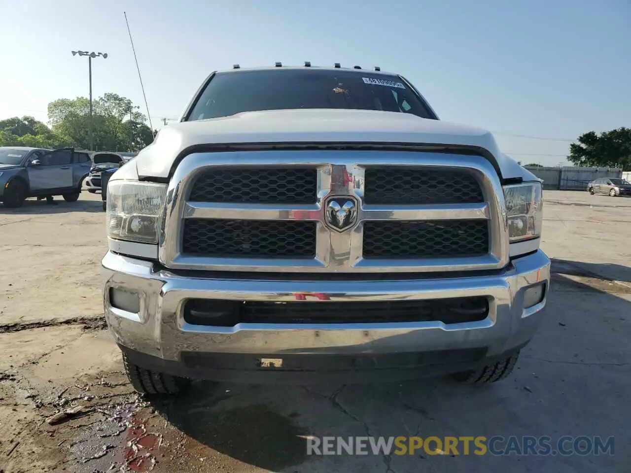 5 Photograph of a damaged car 3C6UR5HJ2RG230415 RAM 2500 2024