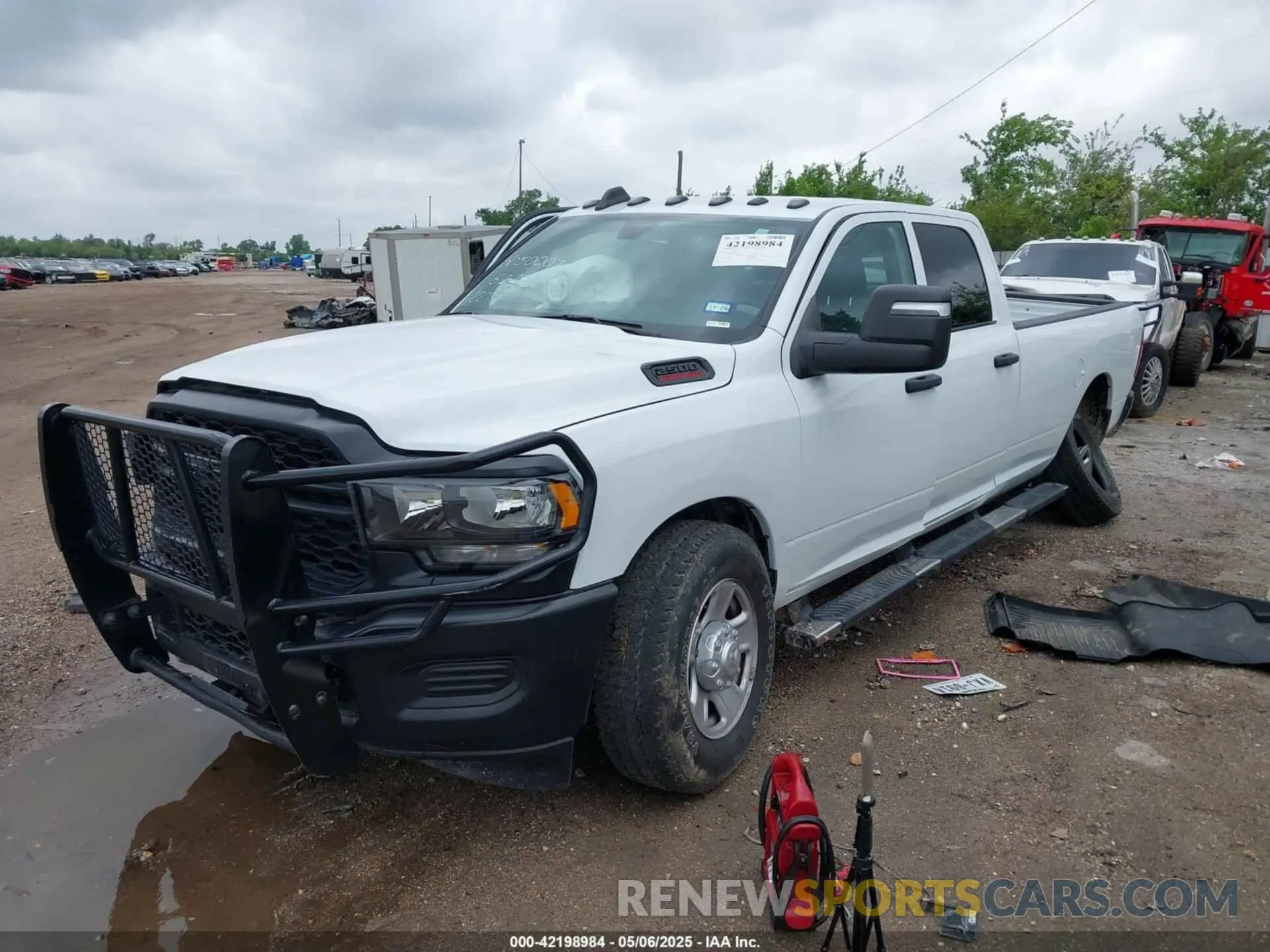 2 Photograph of a damaged car 3C6UR5HJ4RG125908 RAM 2500 2024