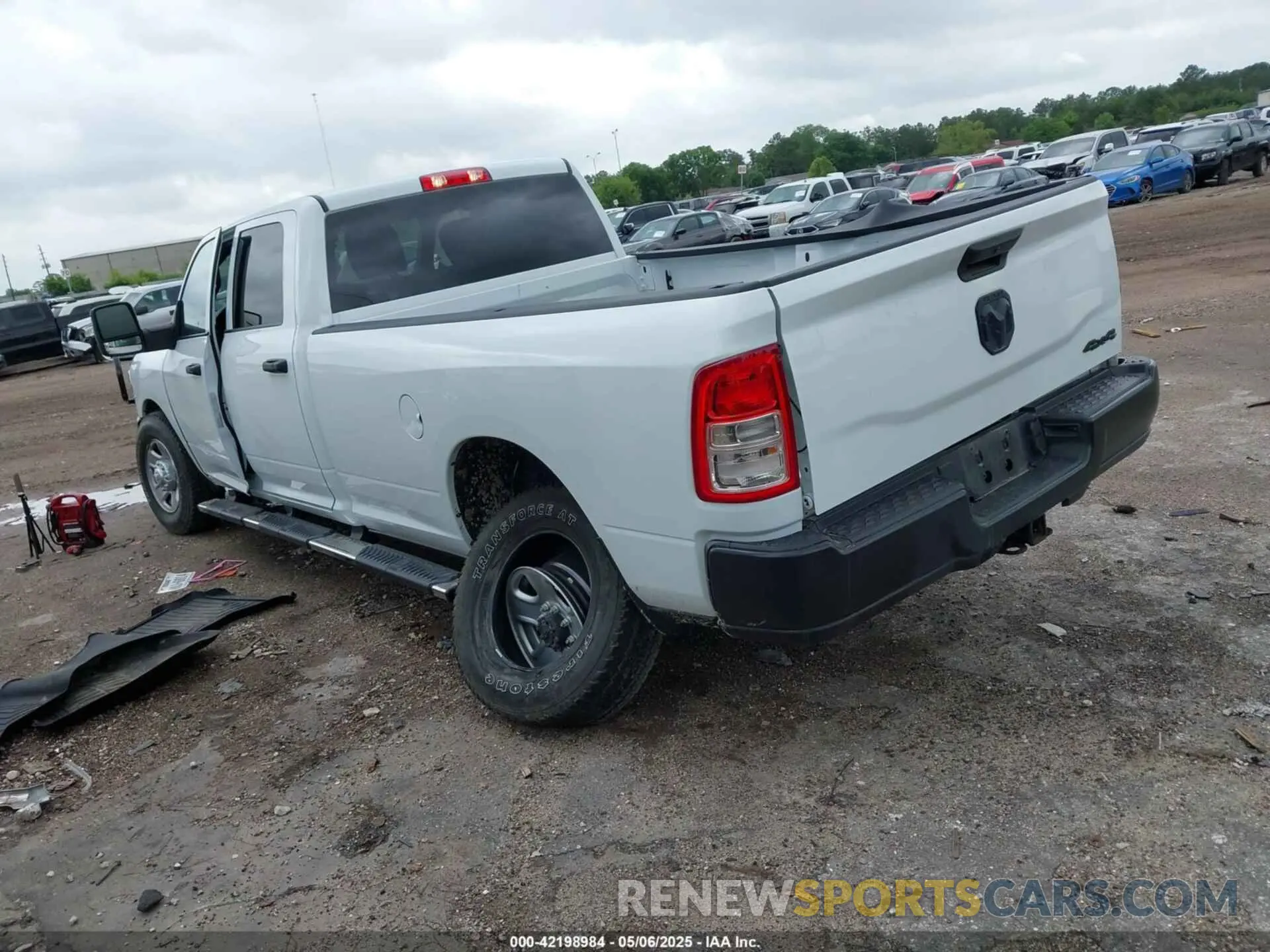 3 Photograph of a damaged car 3C6UR5HJ4RG125908 RAM 2500 2024