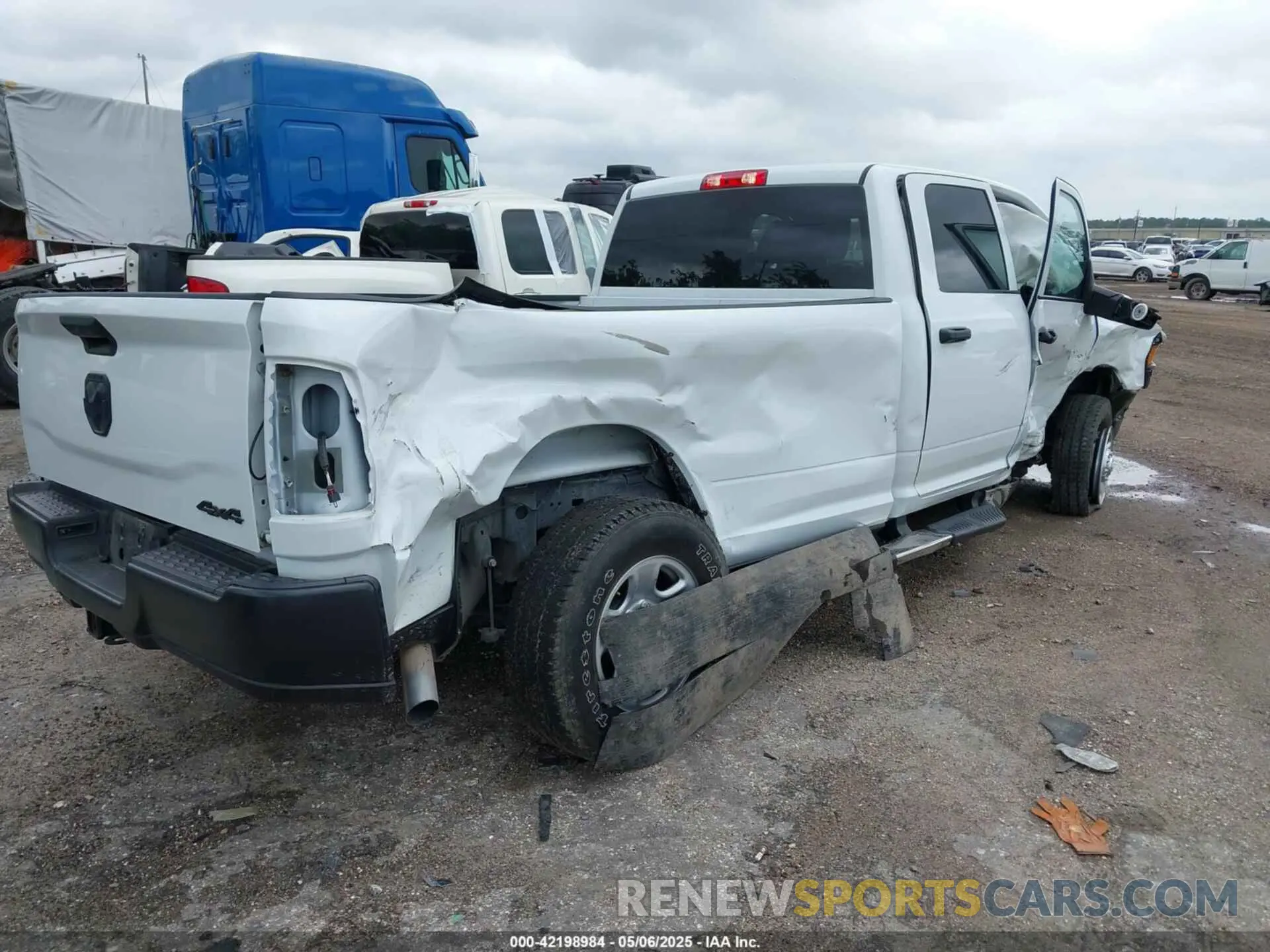 4 Photograph of a damaged car 3C6UR5HJ4RG125908 RAM 2500 2024