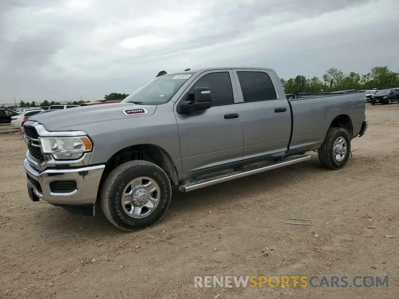 1 Photograph of a damaged car 3C6UR5HJ5RG169223 RAM 2500 2024