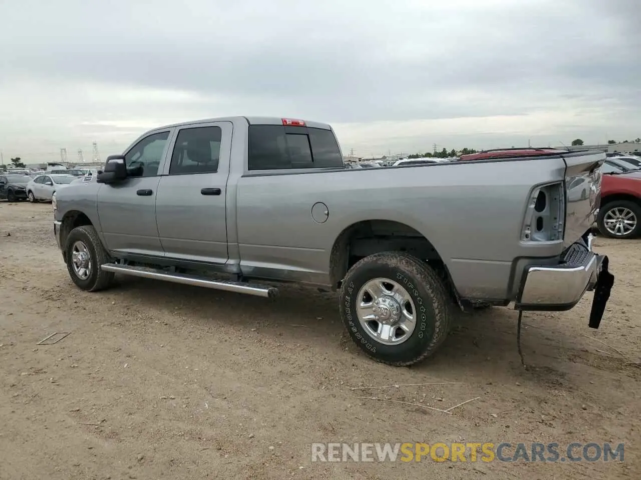 2 Photograph of a damaged car 3C6UR5HJ5RG169223 RAM 2500 2024