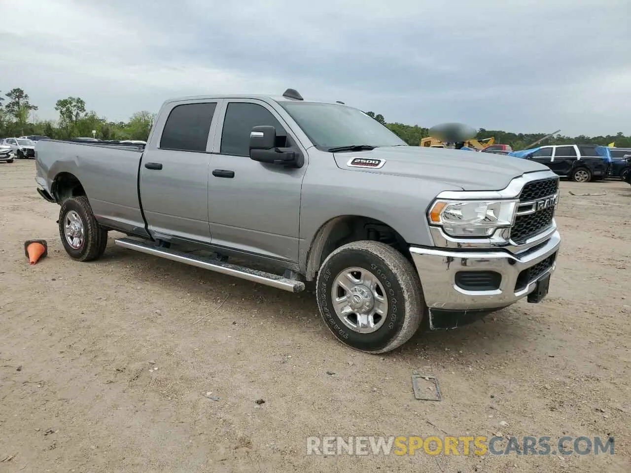 4 Photograph of a damaged car 3C6UR5HJ5RG169223 RAM 2500 2024
