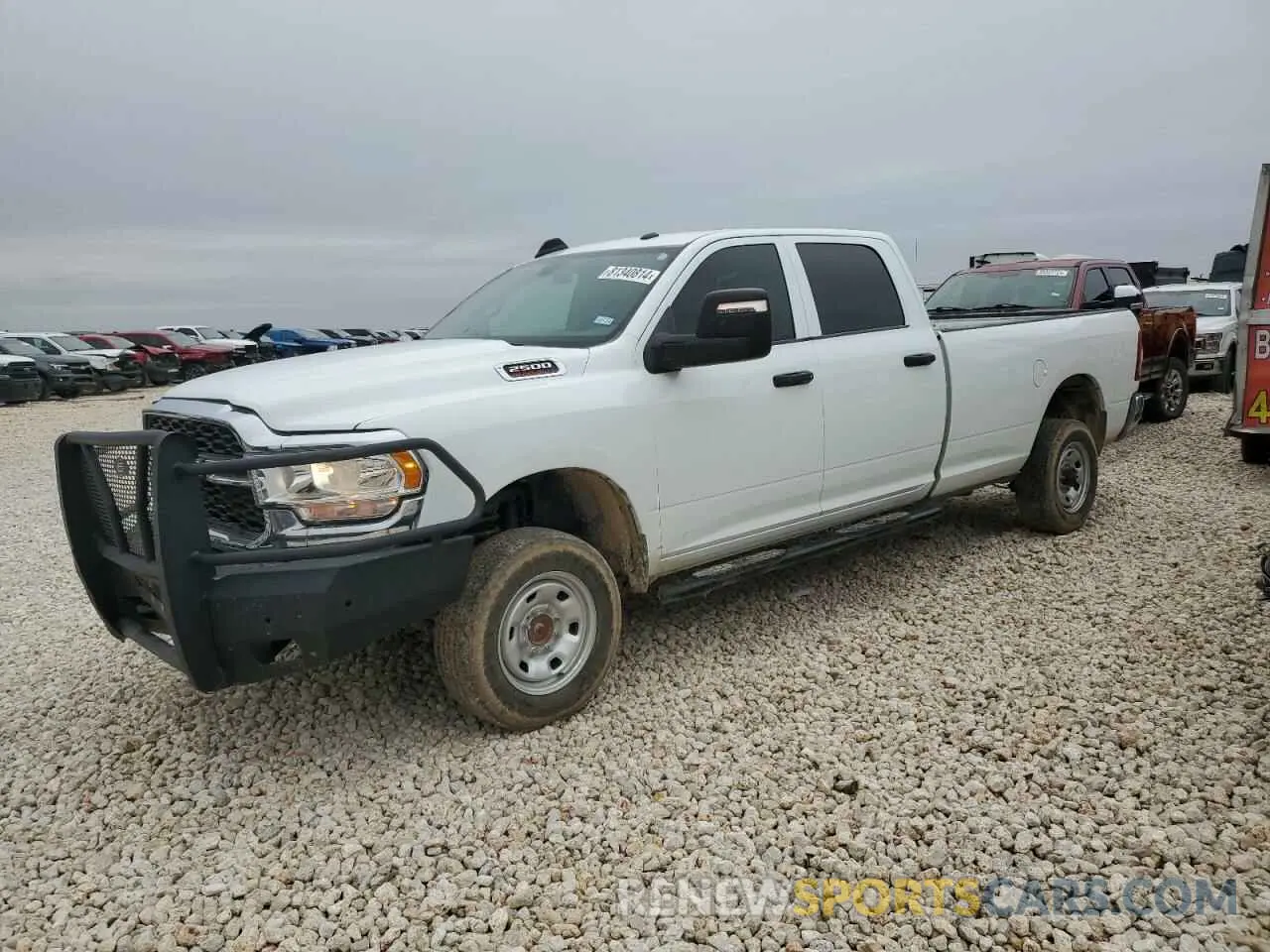1 Photograph of a damaged car 3C6UR5HJ7RG139575 RAM 2500 2024